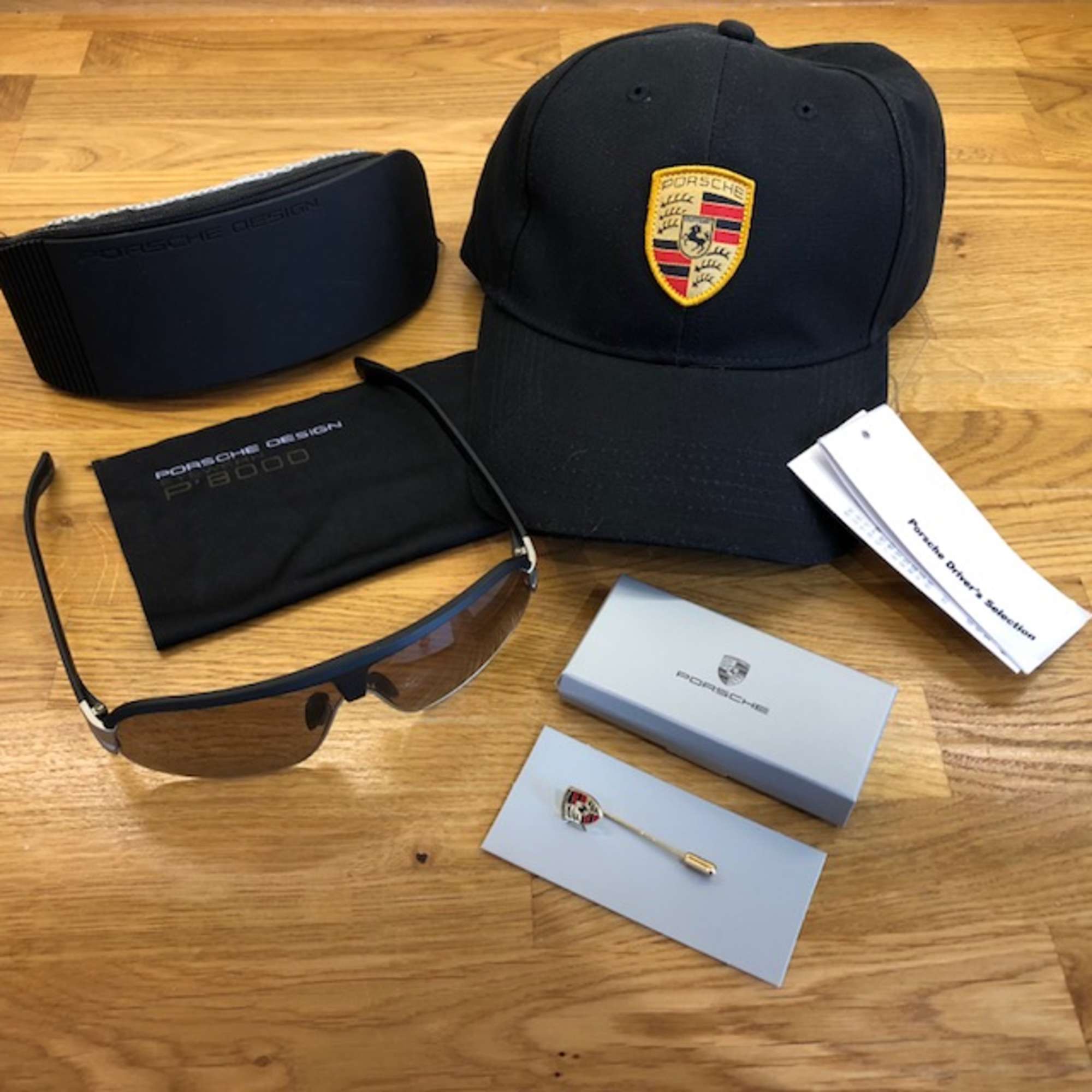 Porsche-badged cap, sunglasses and tie pin-Sold