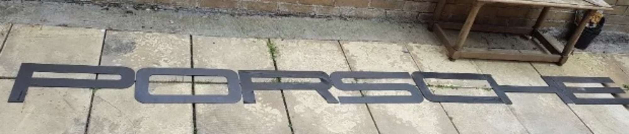 A font-correct 'Porsche' hanging wall sign-Sold