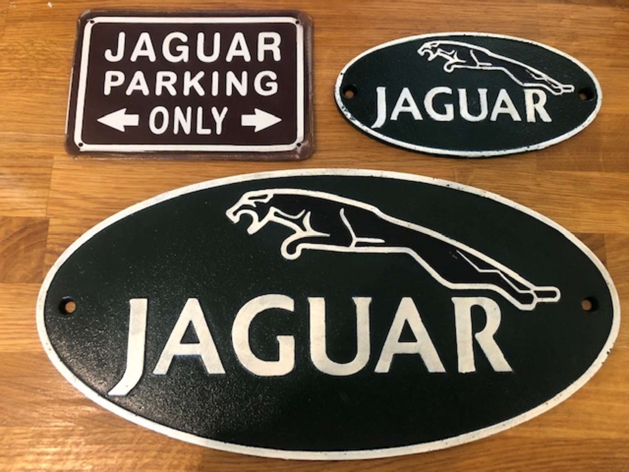 Jaguar-themed cast metal wall signs-Sold