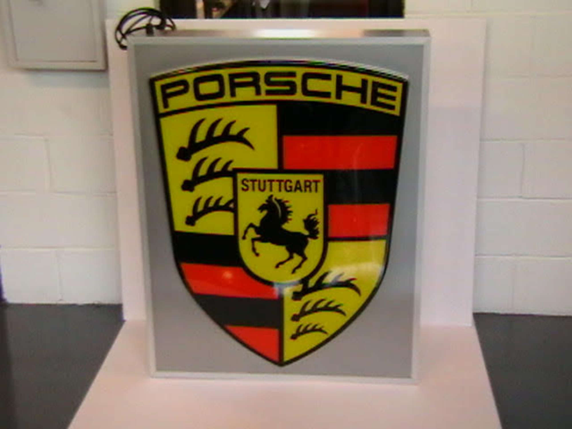 Porsche. Illuminated  sign.-Sold