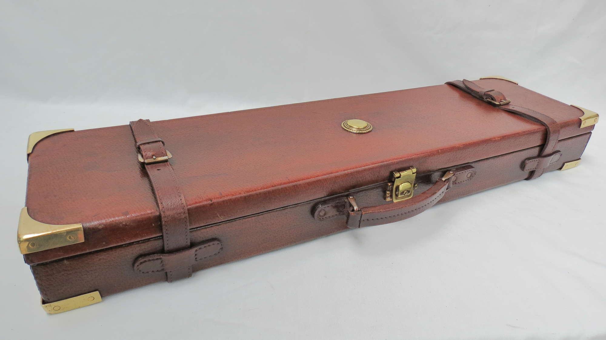 A good leather twelve gauge shotgun case-Sold