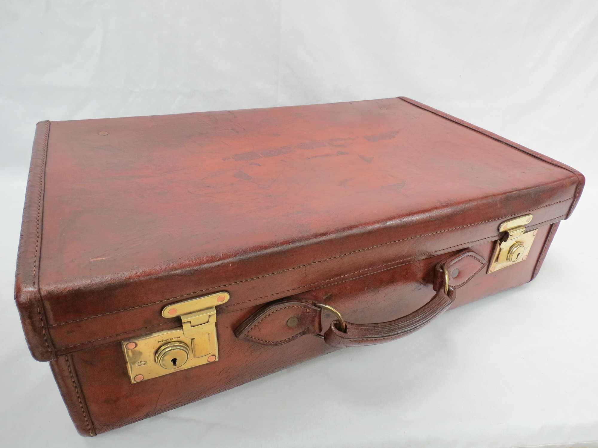 A fine quality Leather Suitcase-Auction Lot