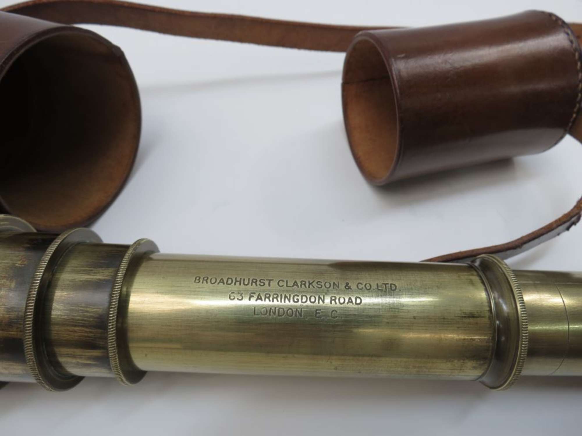 A fine four drawer and single drawer sunshade brass and leat-Auction Lot