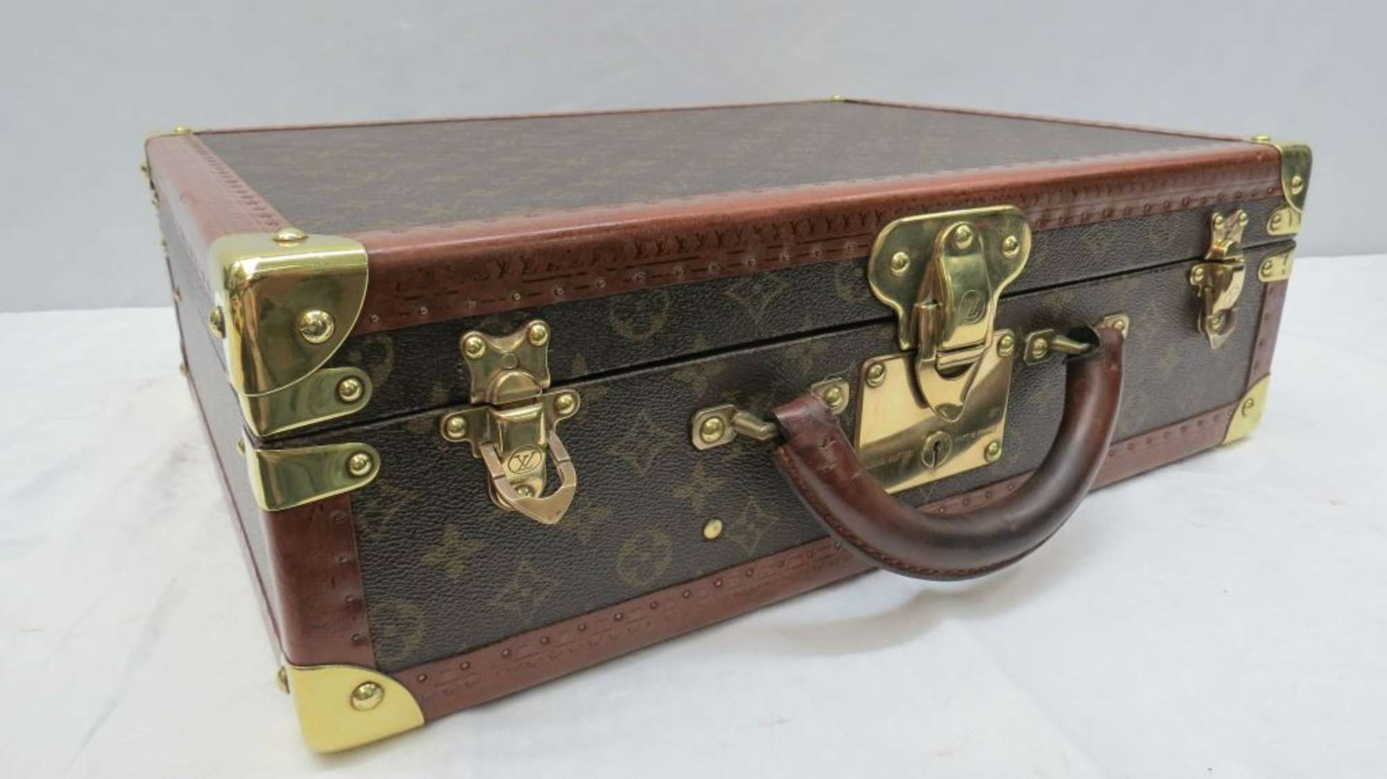 A Louis Vuitton Briefcase-Auction Lot