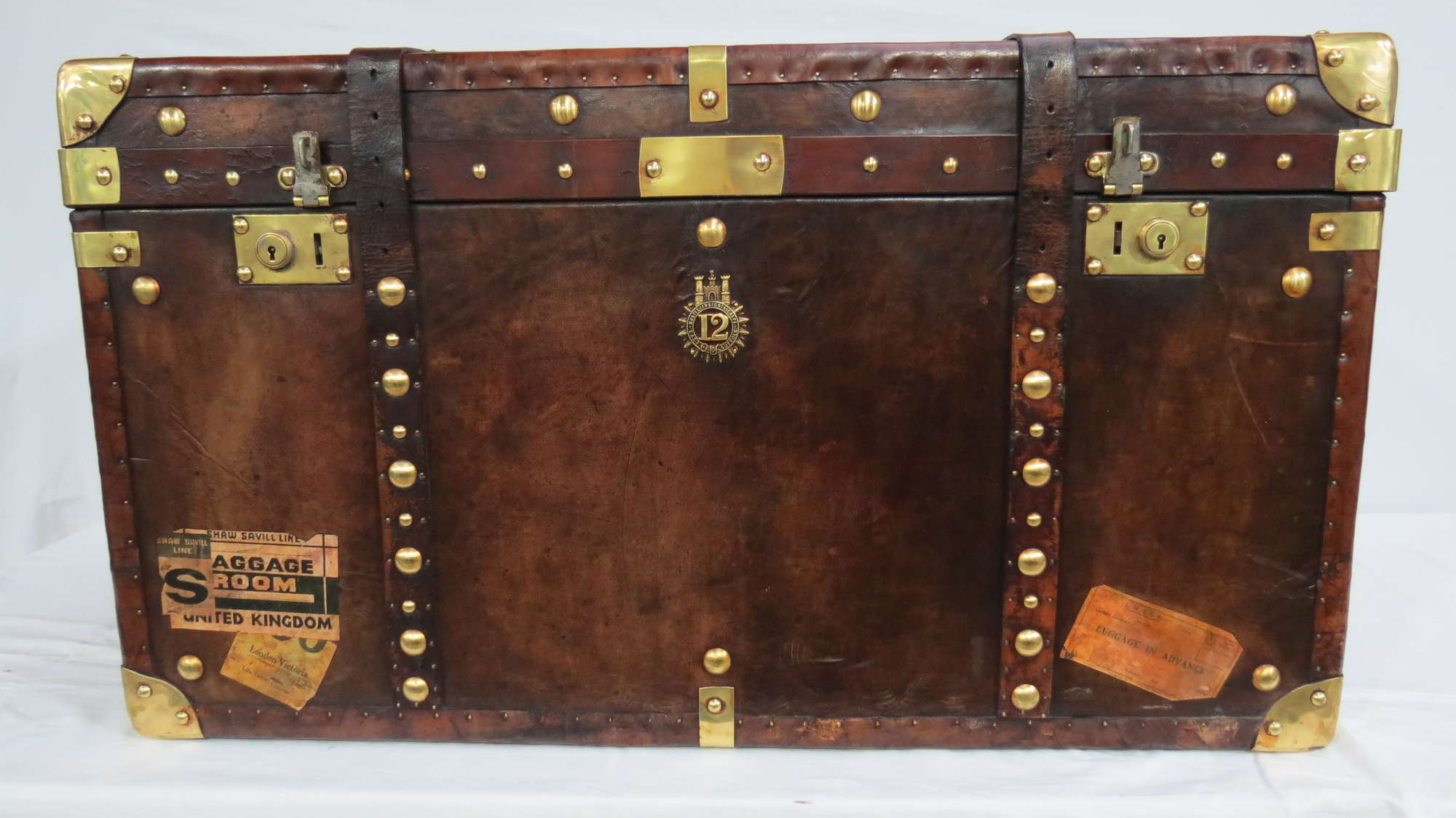 A large Army & Navy leather covered Travel Trunk -Sold