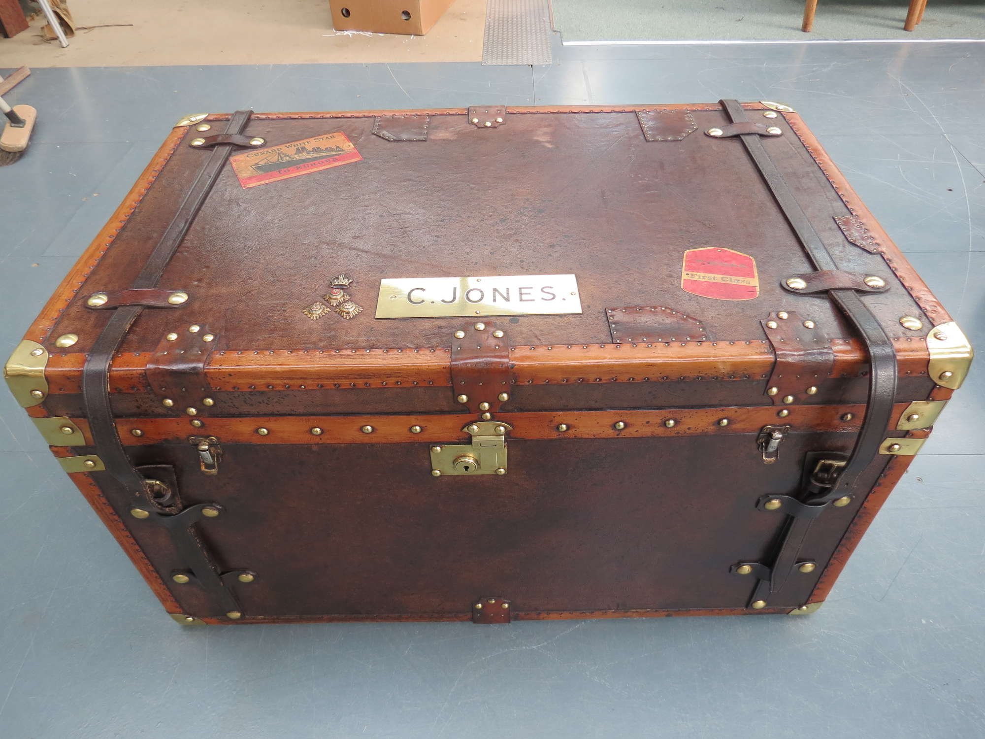 A large 'Army and Navy' leather covered Travel Trunk-Sold