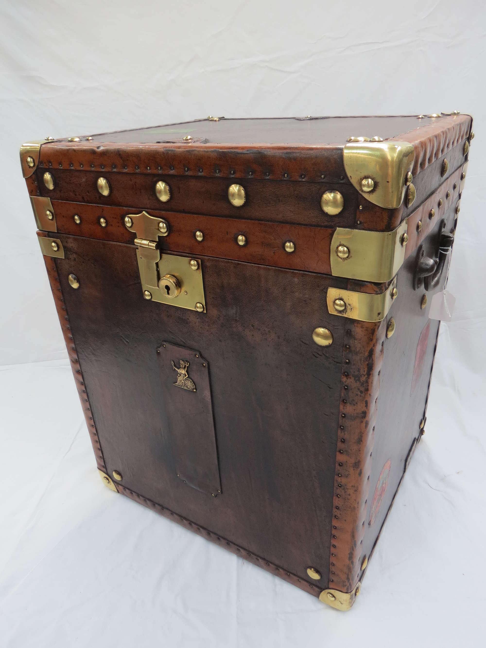 An 'Army and Navy' leather covered Travel Trunk-Sold