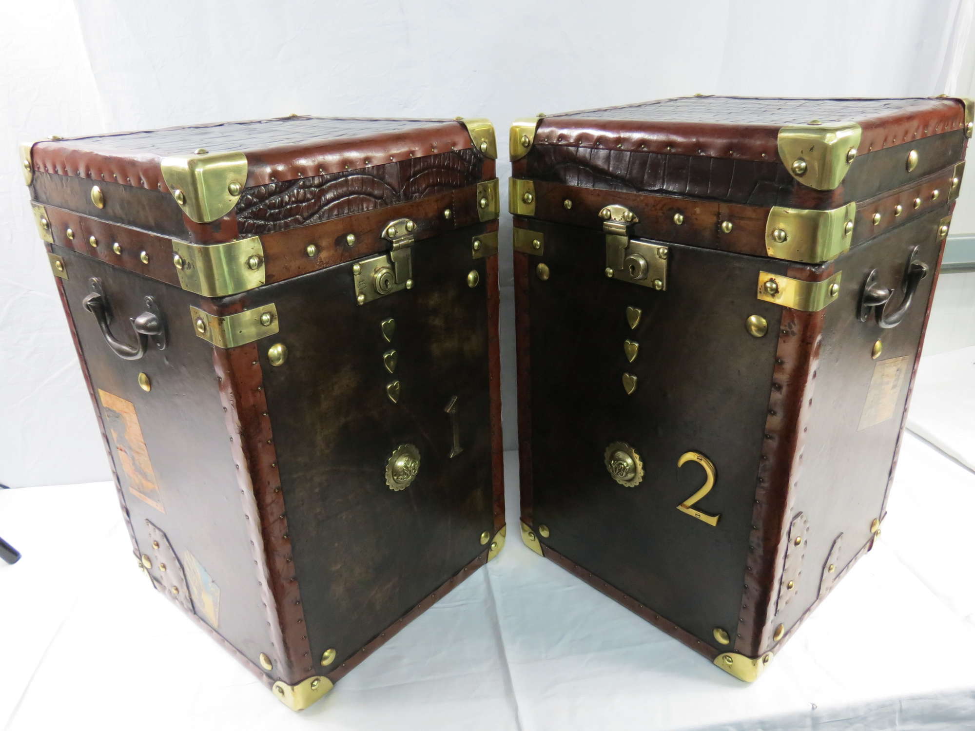 A pair of Army & Navy Travel Trunks-Sold