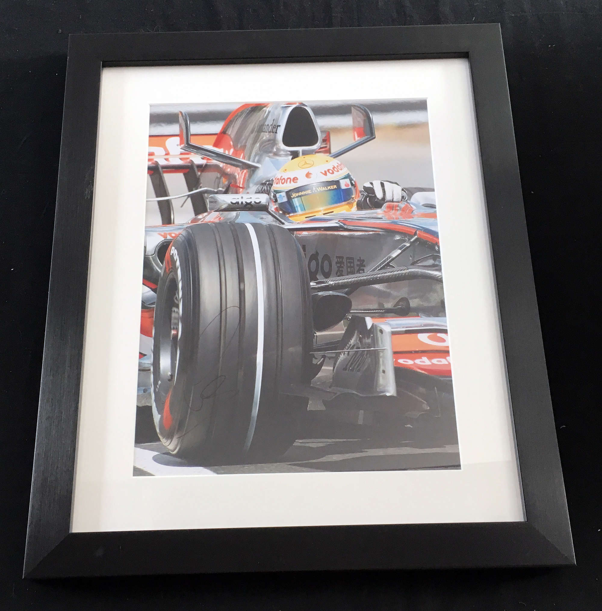 Lewis Hamilton signed McLaren photo. -Sold