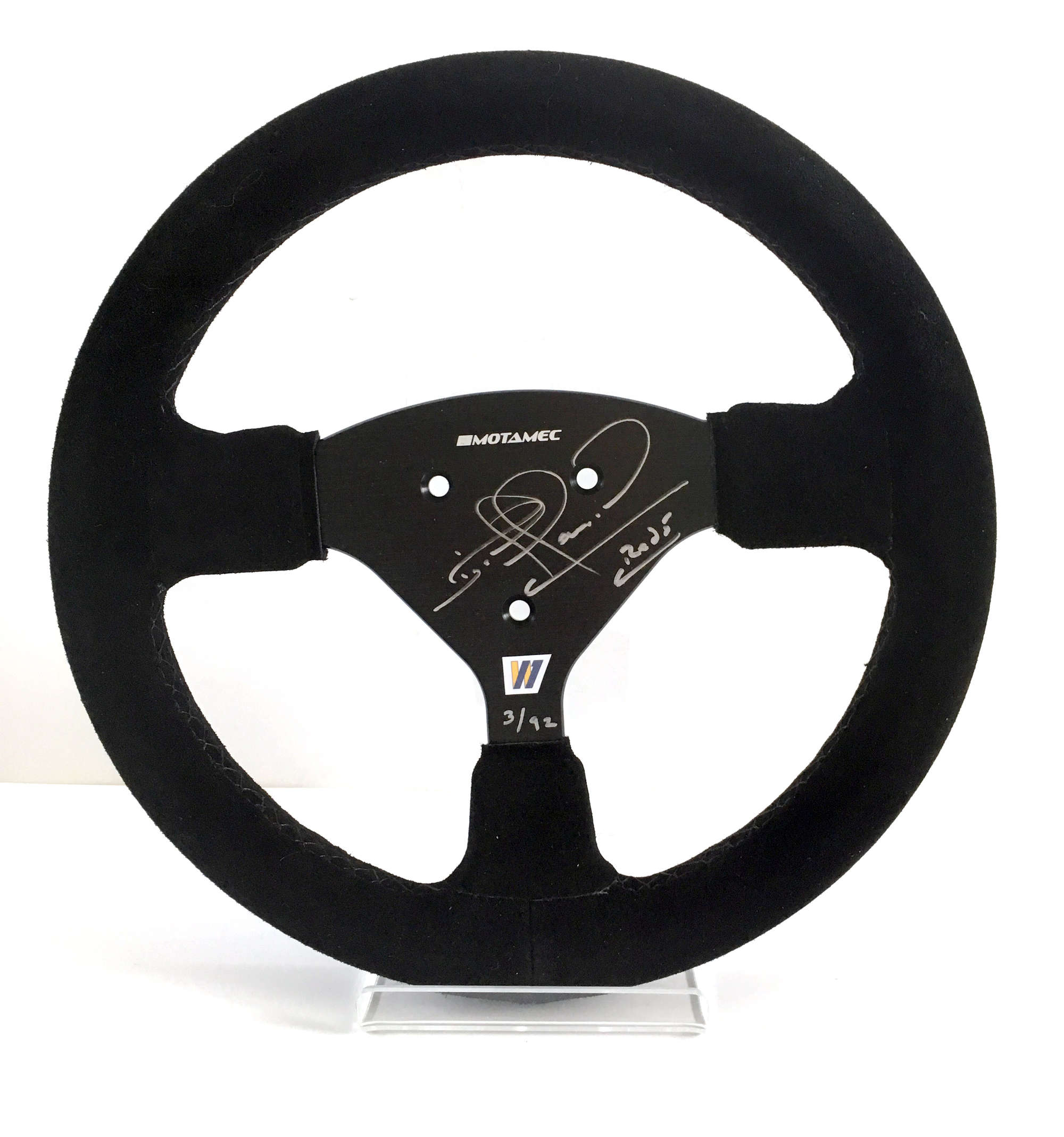 Racing steering wheel signed by Nigel Mansell CBE.-Sold
