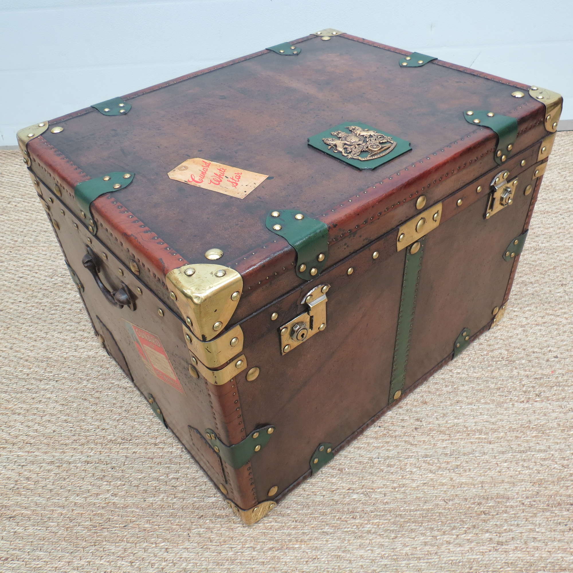 A large Army and Navy leather travel trunk-Sold