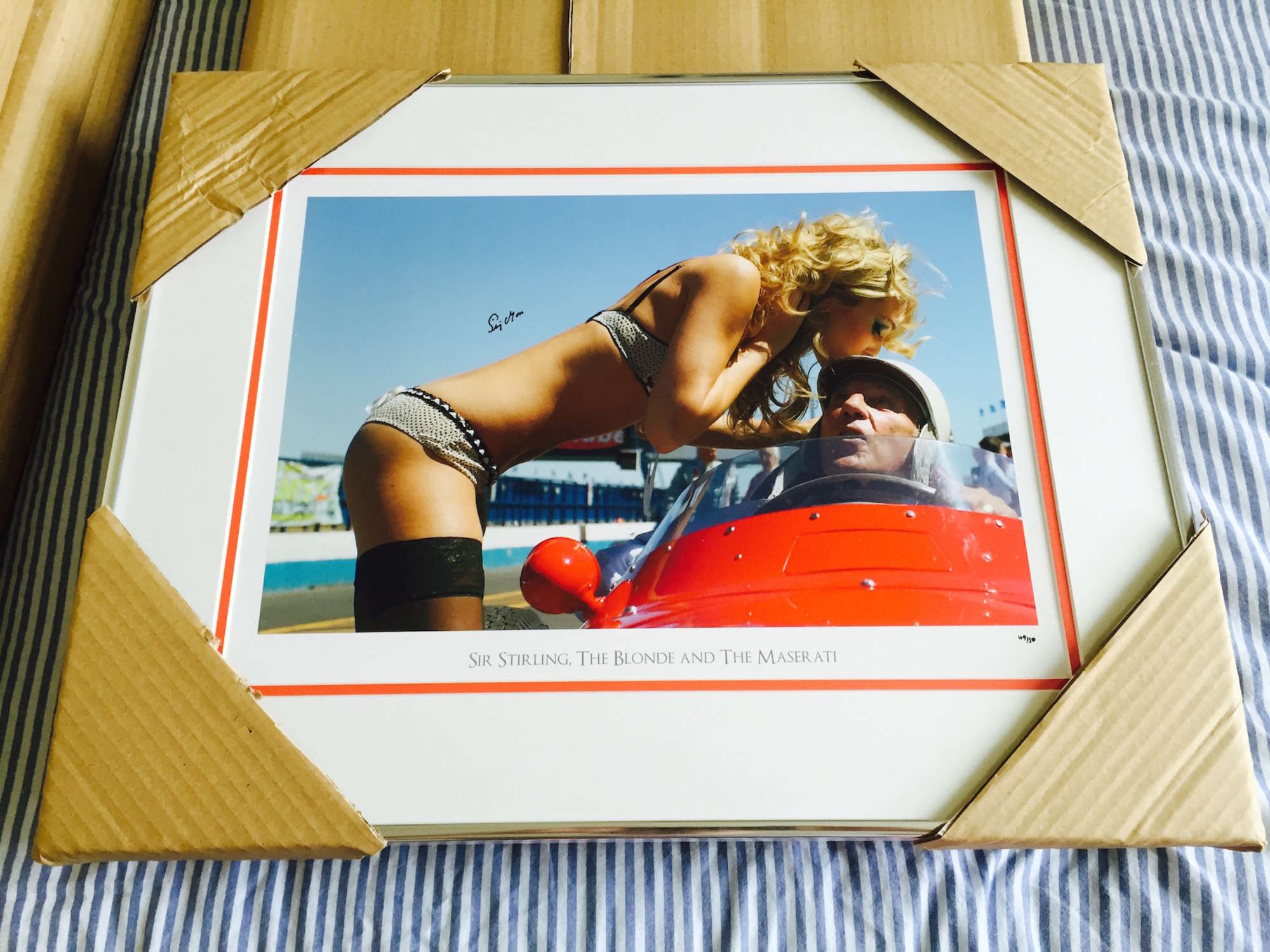 Sir Stirling, the Blonde and the Maserati;-Sold