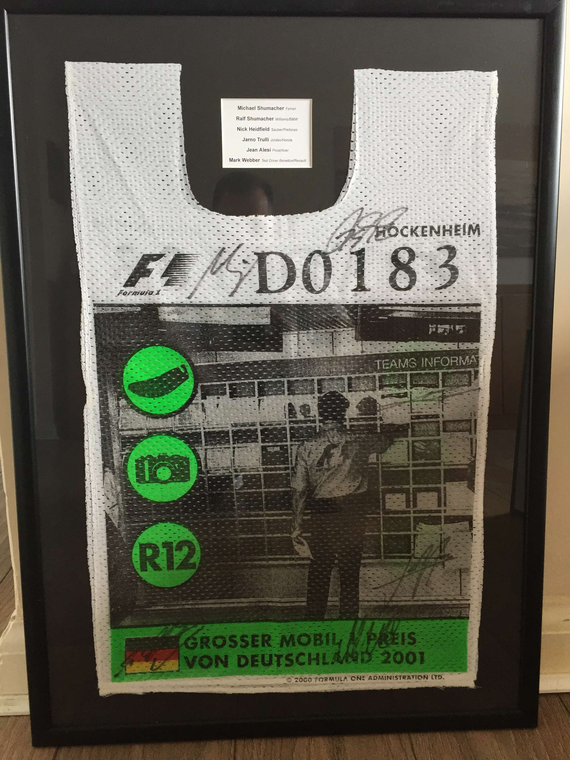 Michael Schumacher signed Marshals race Tabard.-Sold