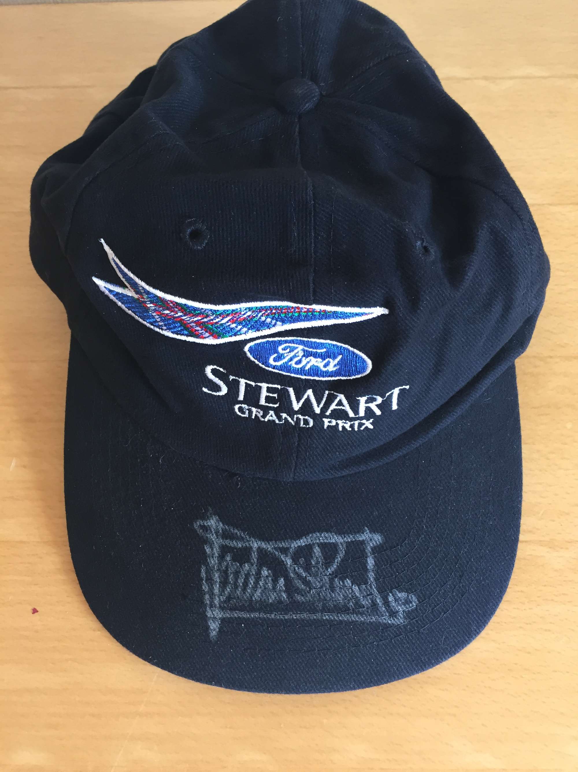 Sir Jackie Stewart Mixed Signed Lot . -Sold