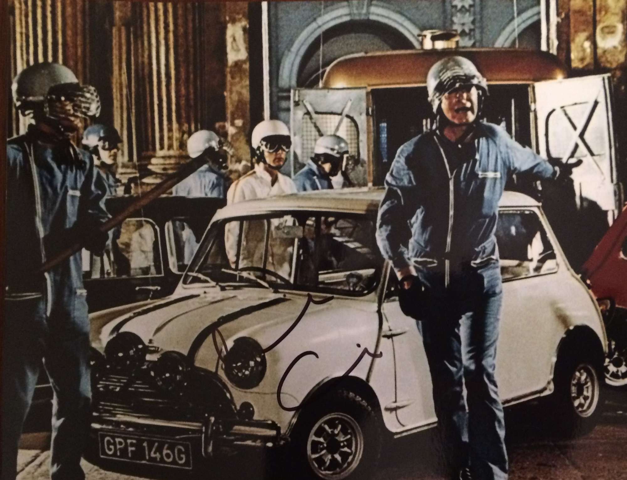 'The Italian Job'. A still signed by Sir Michael Caine*-Sold