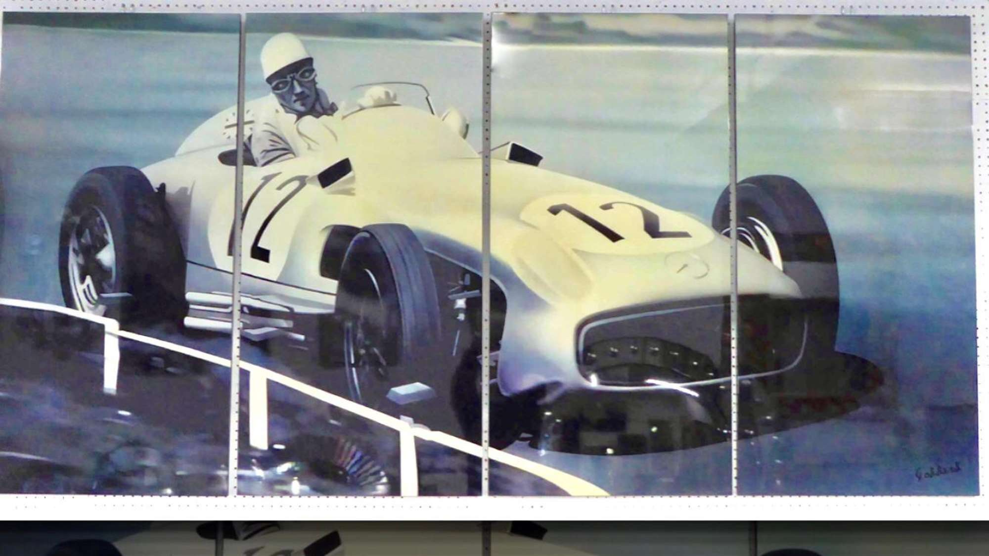 Sir Stirling Moss OBE.  4-panel display.-Sold