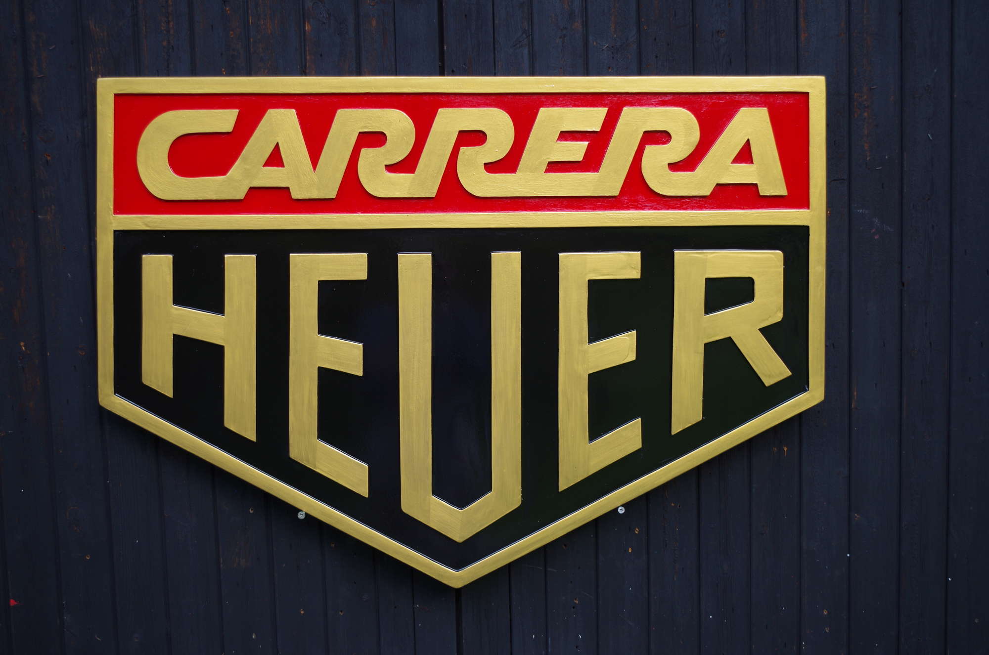 Carrera Heuer wall sign.-Sold