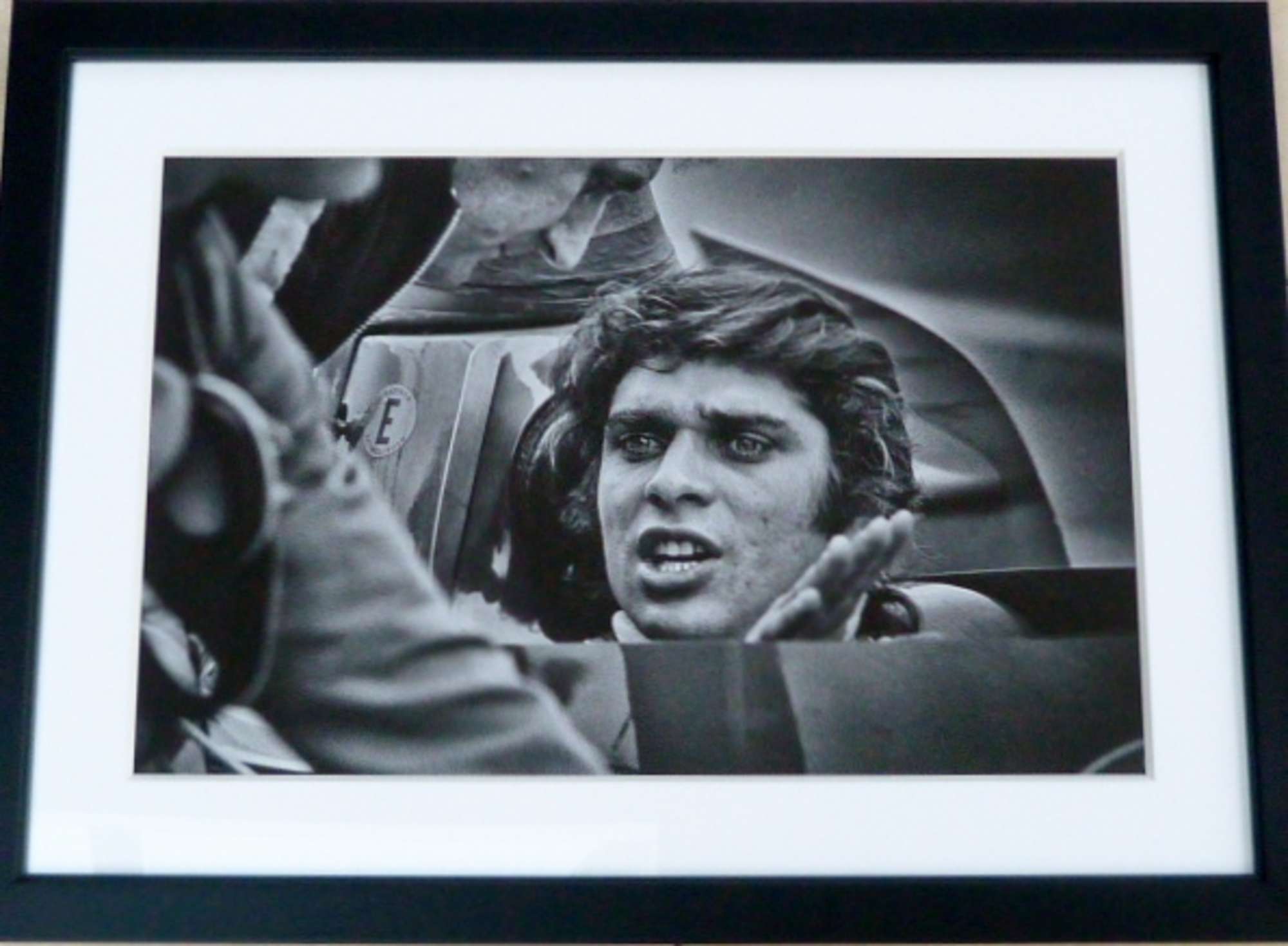 Pair of F1 driver portraits.-Sold