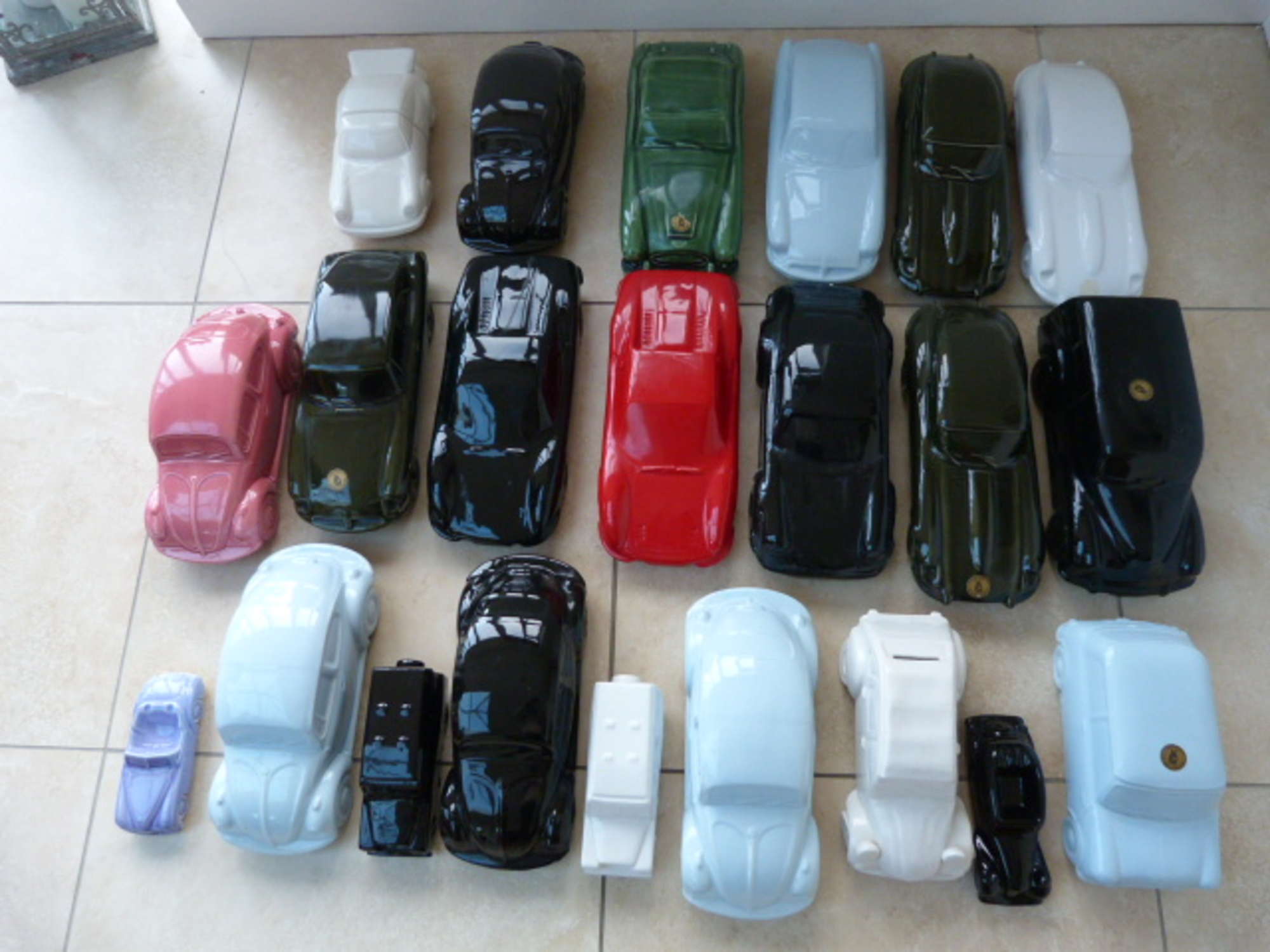 Collection of ceramic model cars.-Sold
