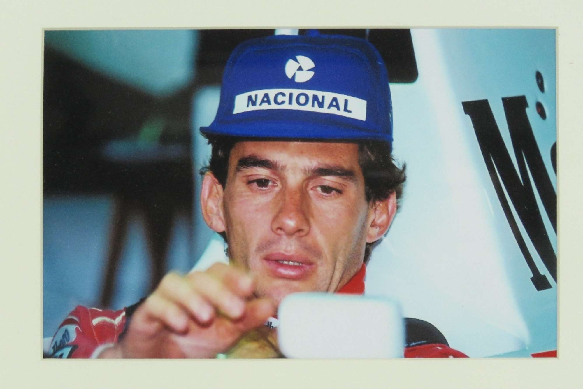 Ayrton Senna autograph in photographic montage-Sold