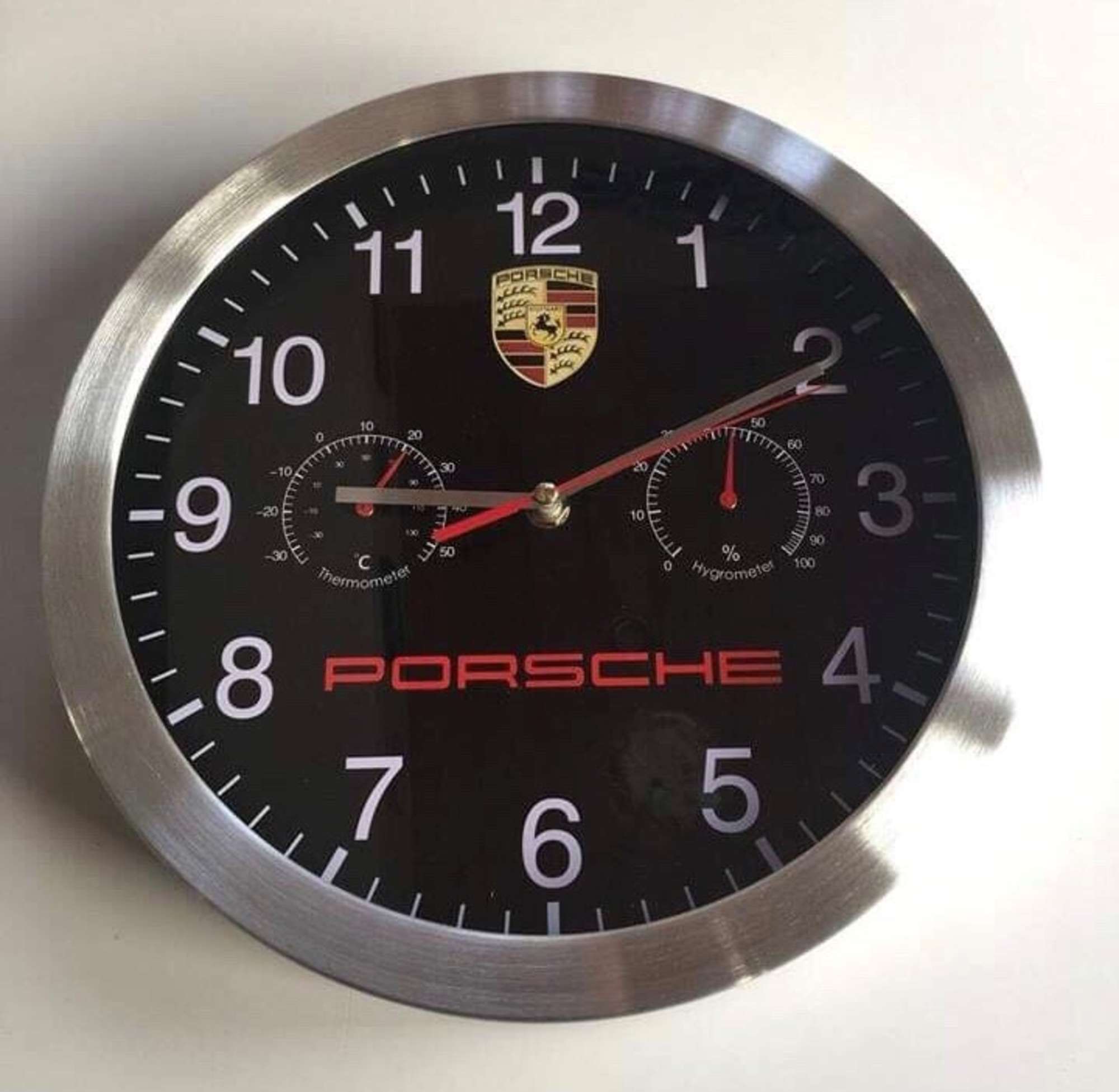 A fine Porsche circular wall clcok-Sold