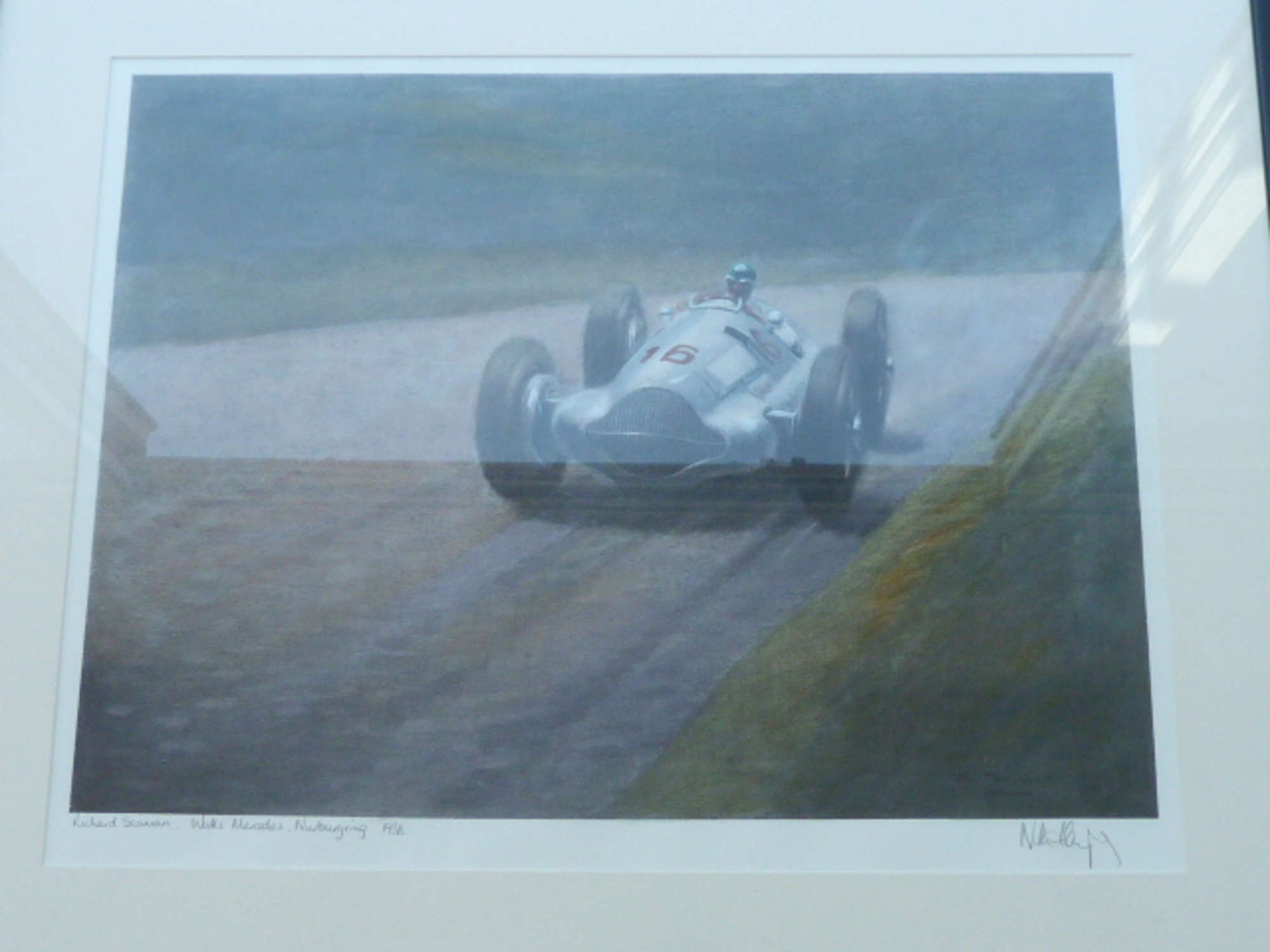 Richard Seaman in the W196.-Sold