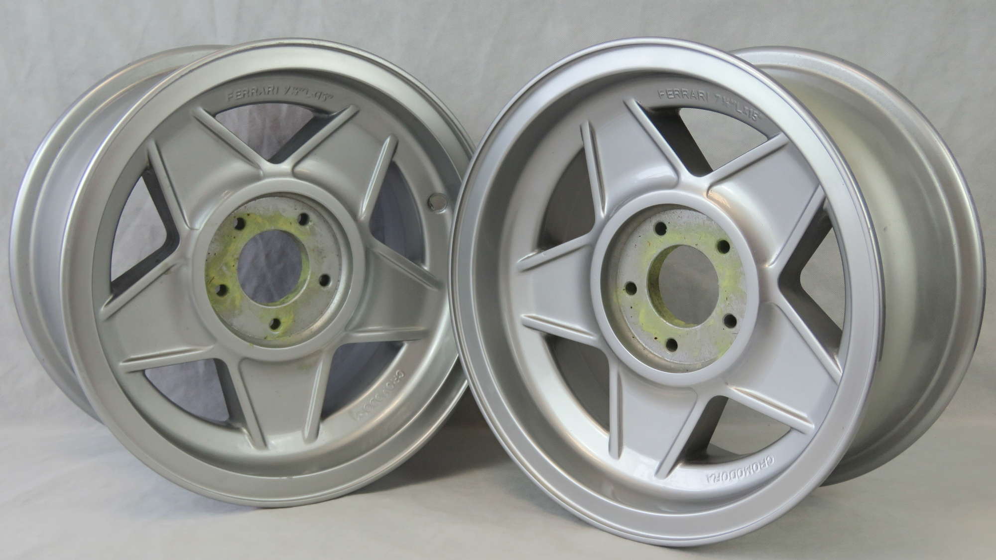 A pair of Ferrari Cromodora alloy wheels.-Auction Lot