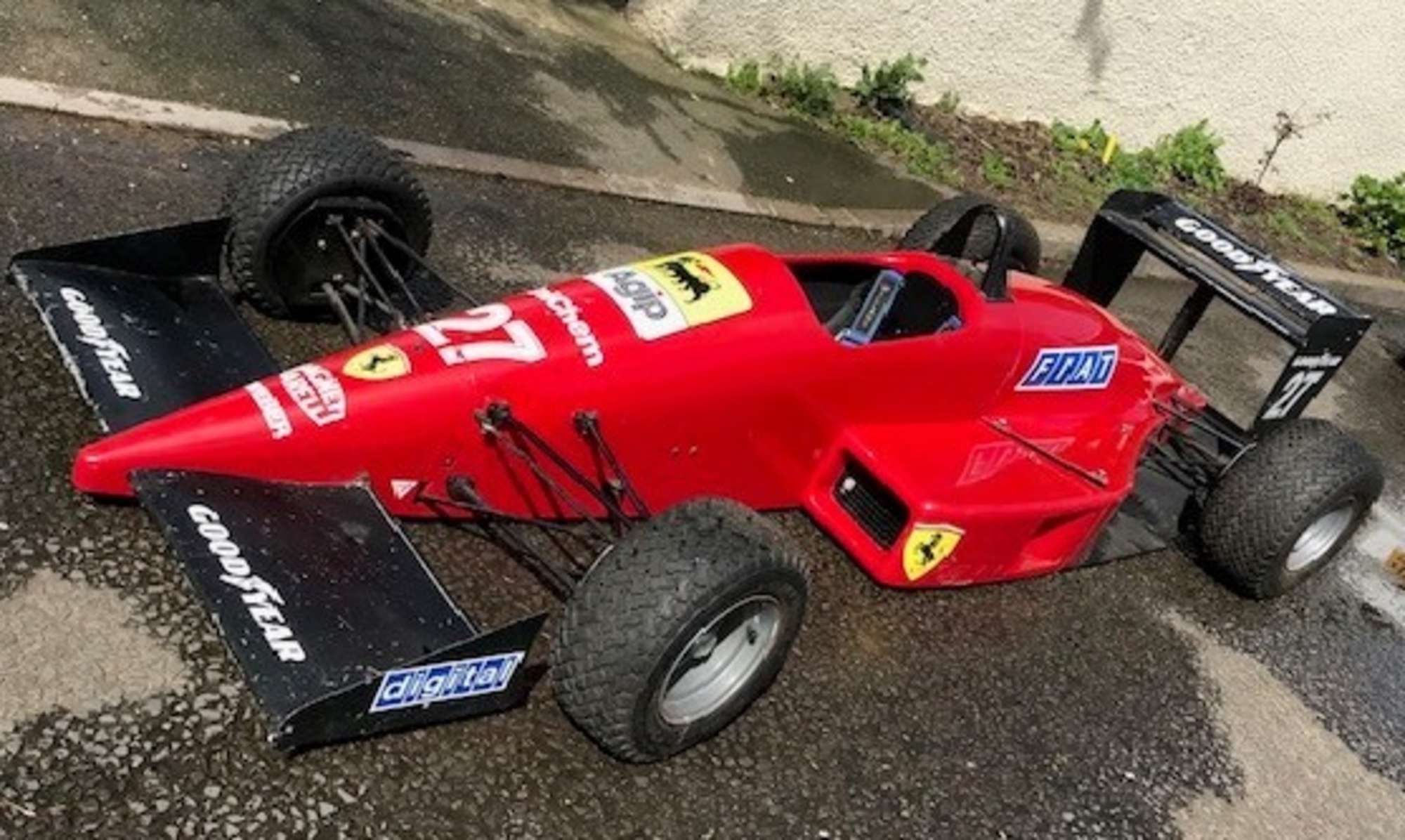 Ferrari Junior child's racing car.(powered)-Auction Lot