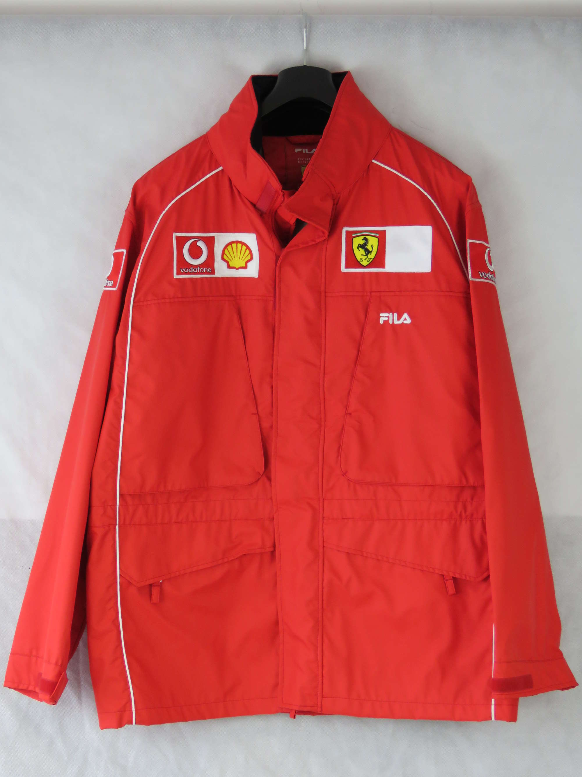 New red Ferrari Scuderria waterproof jacket.-Sold