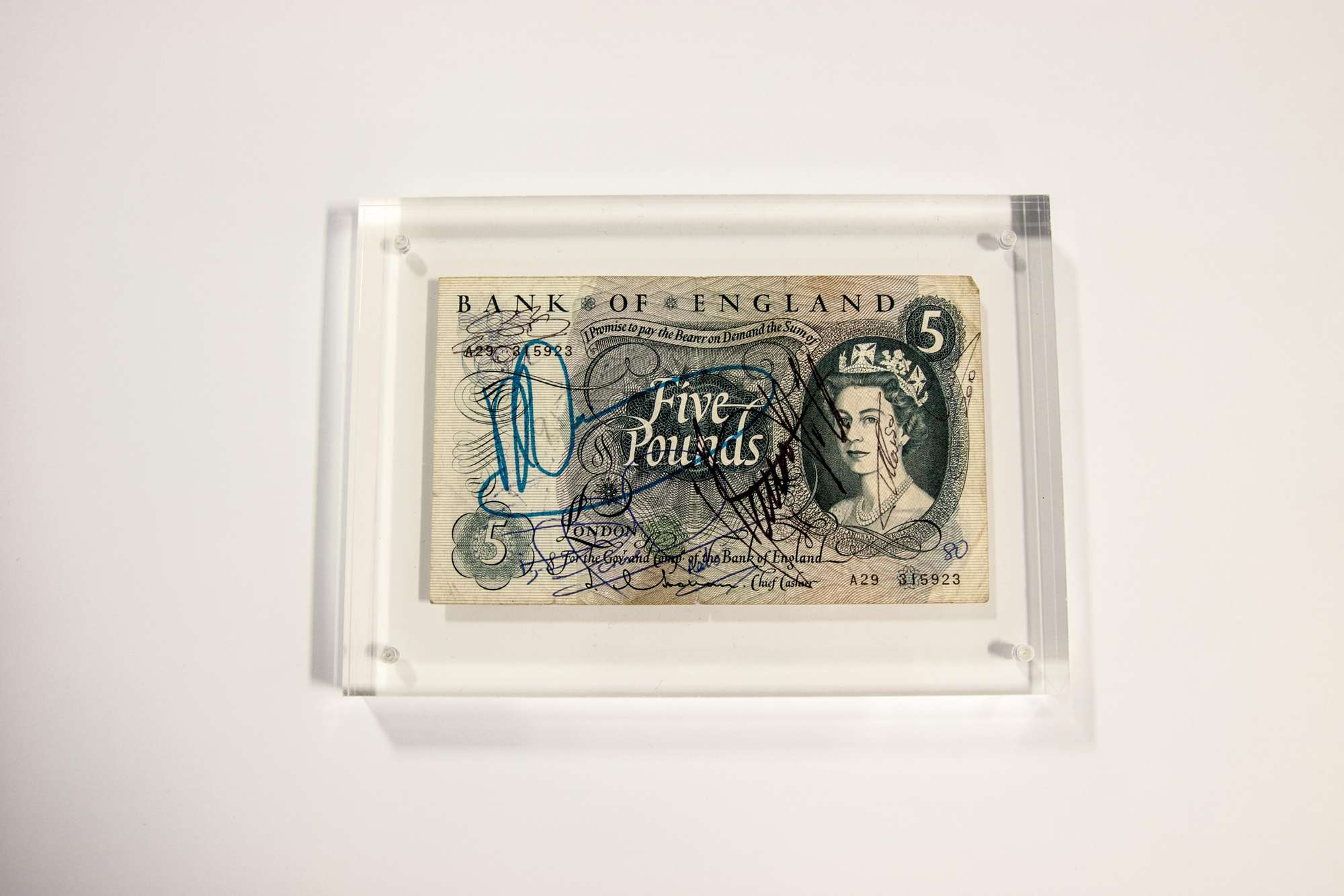 Unique signed £5 note.-Sold