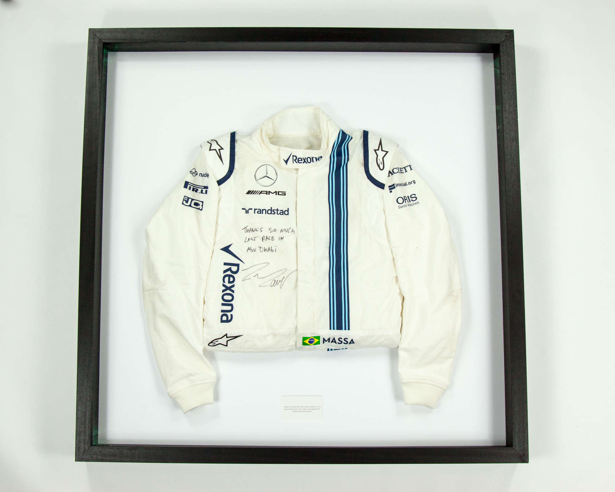 Felipe Massa's last F1 race suit.-Sold
