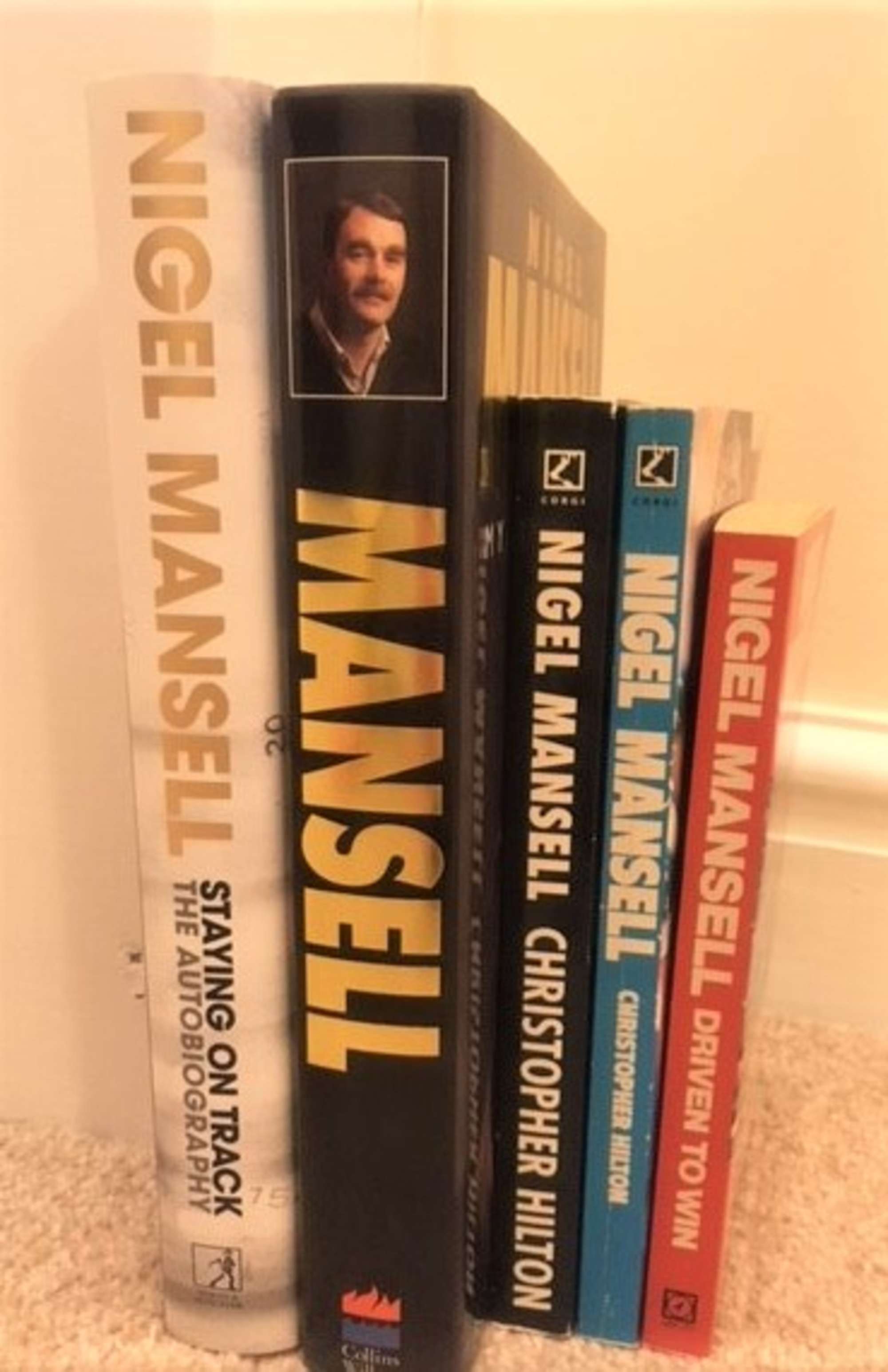 A selection of assorted motorsport volumes.-Auction Lot