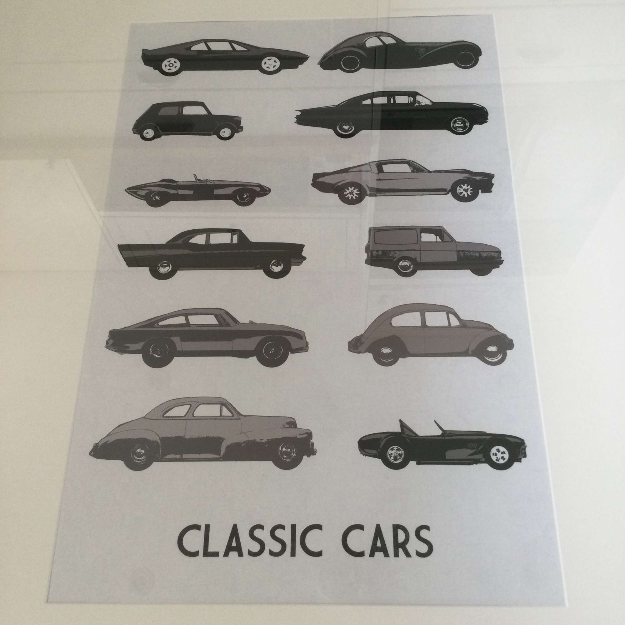 A Fine Monochromatic Framed ‘Classic Cars’ Art Print.-Auction Lot