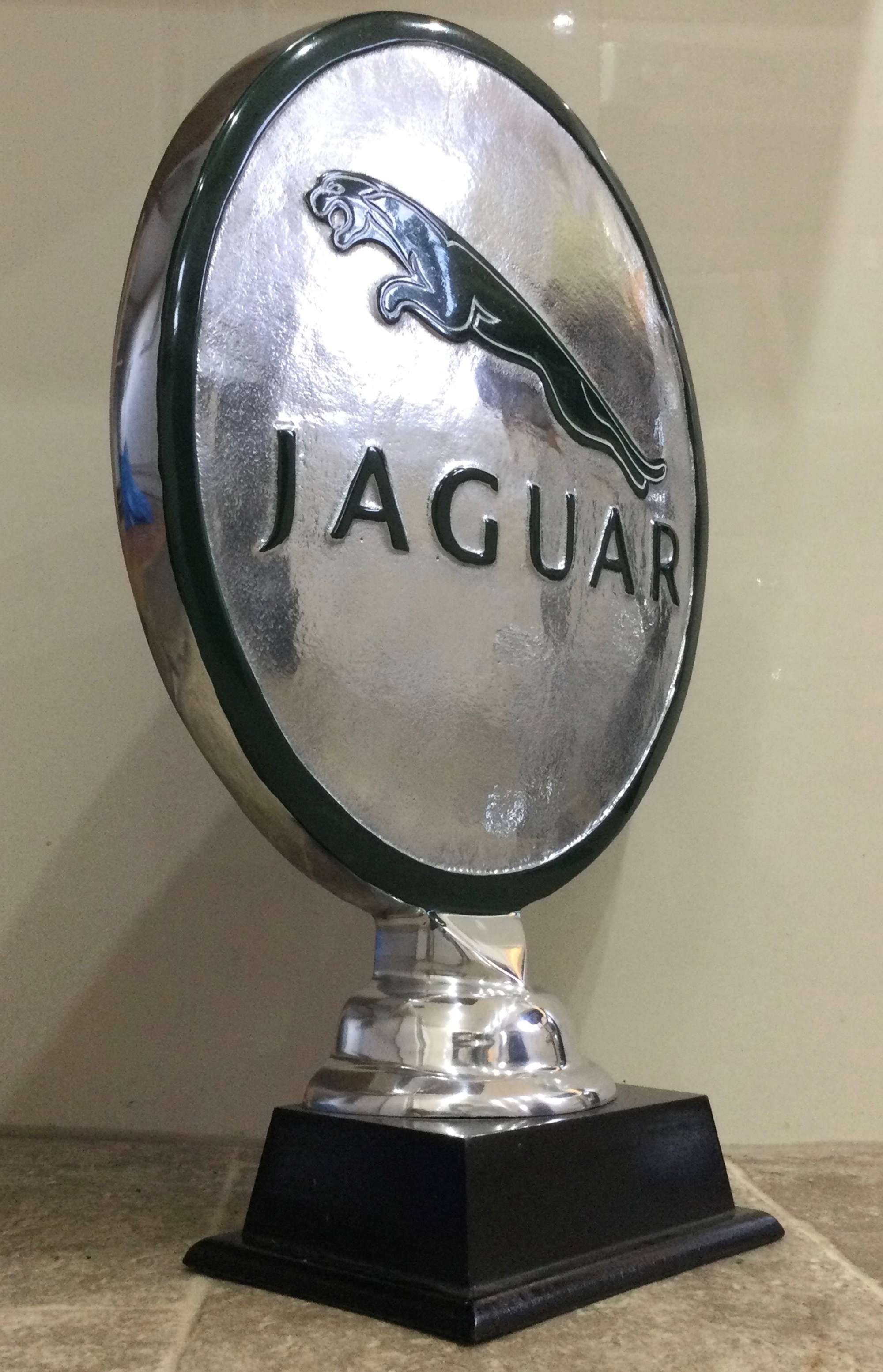 A Jaguar-Themed Cast Aluminium Trophy-Type Roundel-Sold