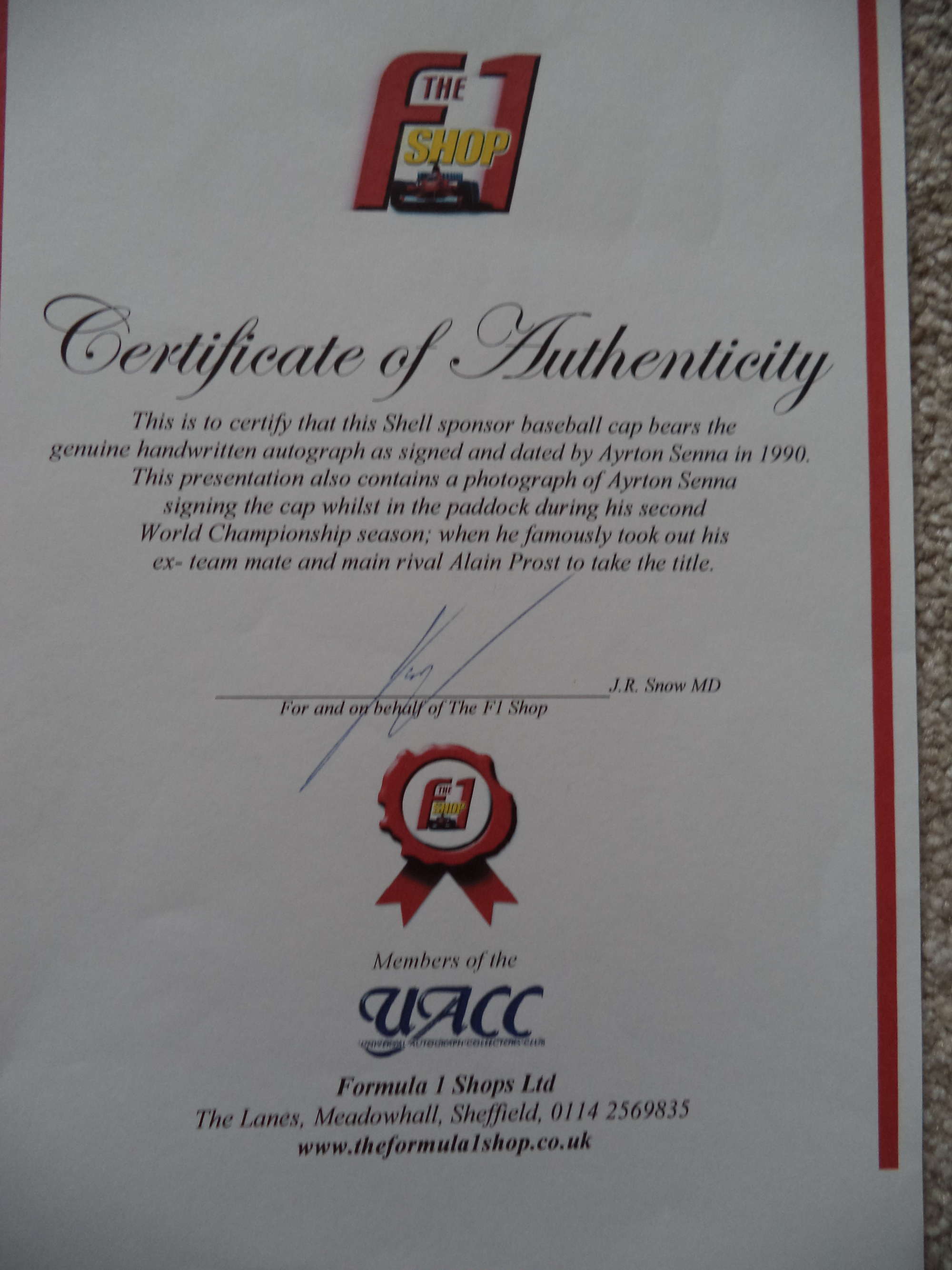 Framed 'Shell' cap hand-signed by Ayrton Senna-Sold