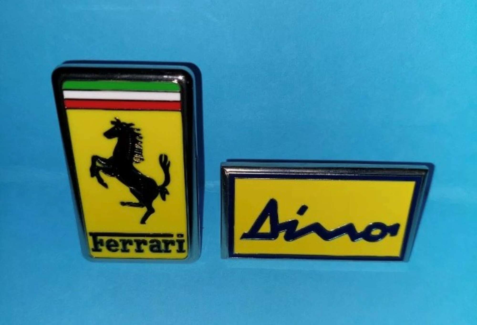 Two original Ferrari car badges-Sold