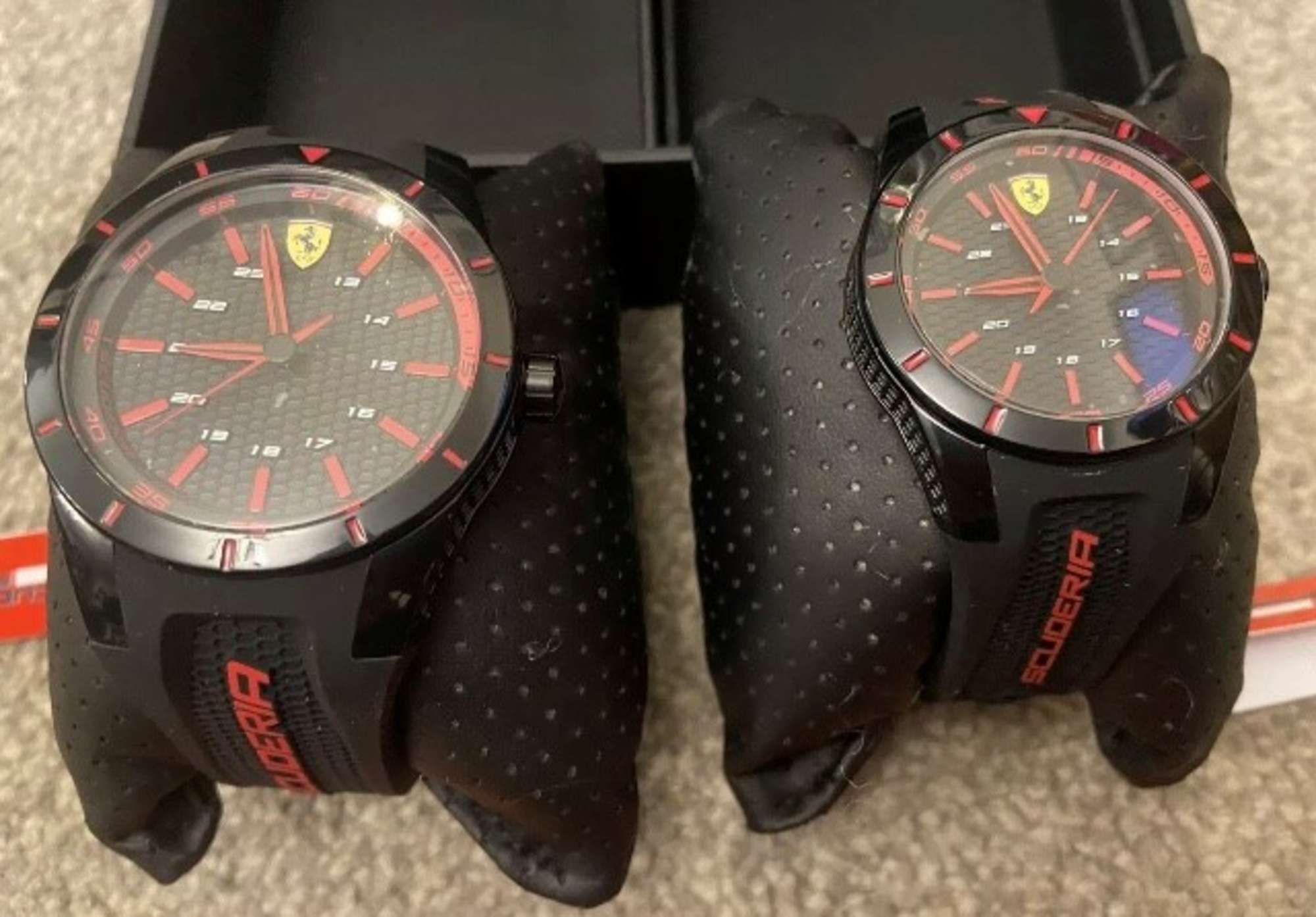 A rare boxed pair of 'His & Hers' Scuderia Ferrari Sports wa-Sold