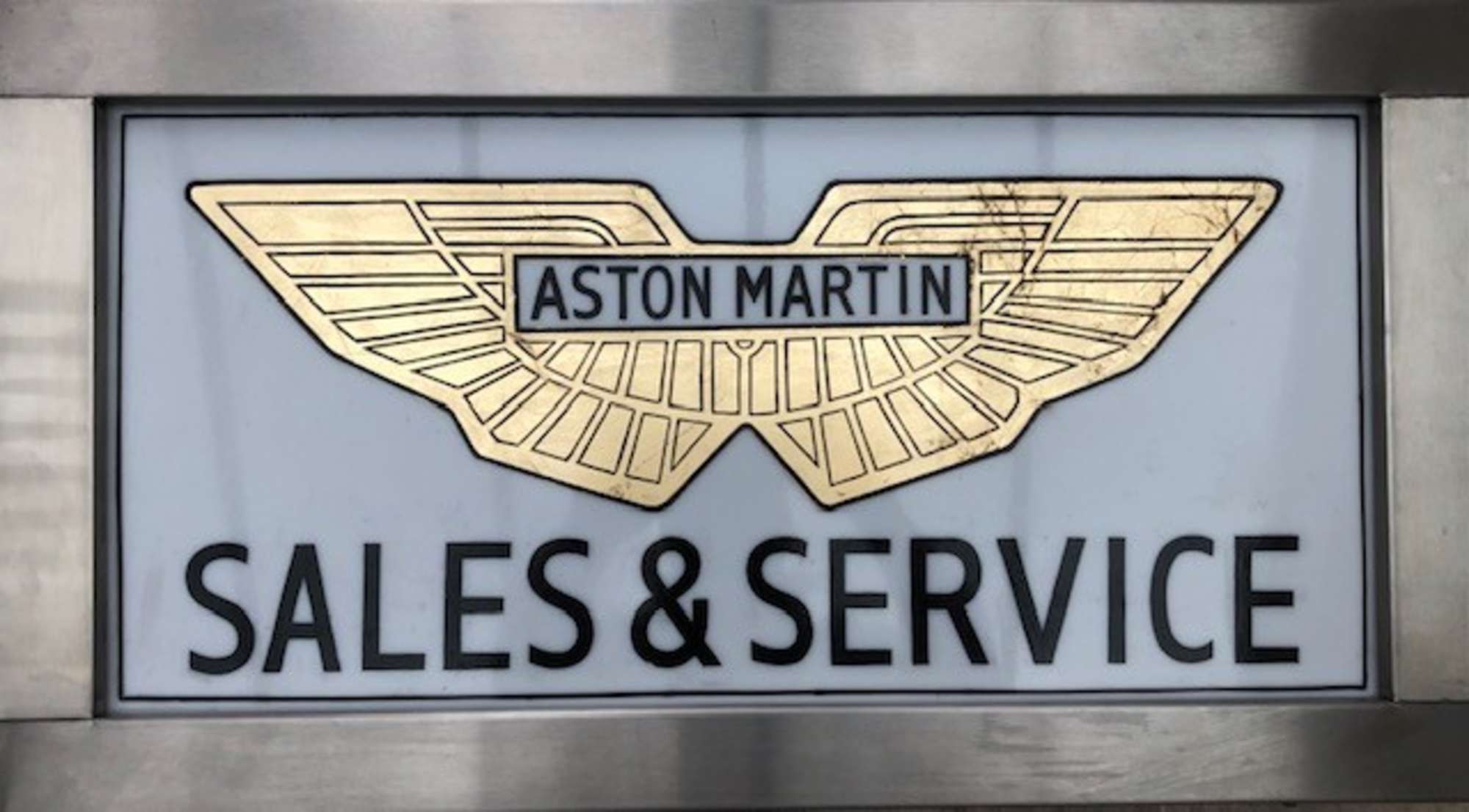 A rare sign-written Aston Martin 'Sales & Service' Dealershi-Sold