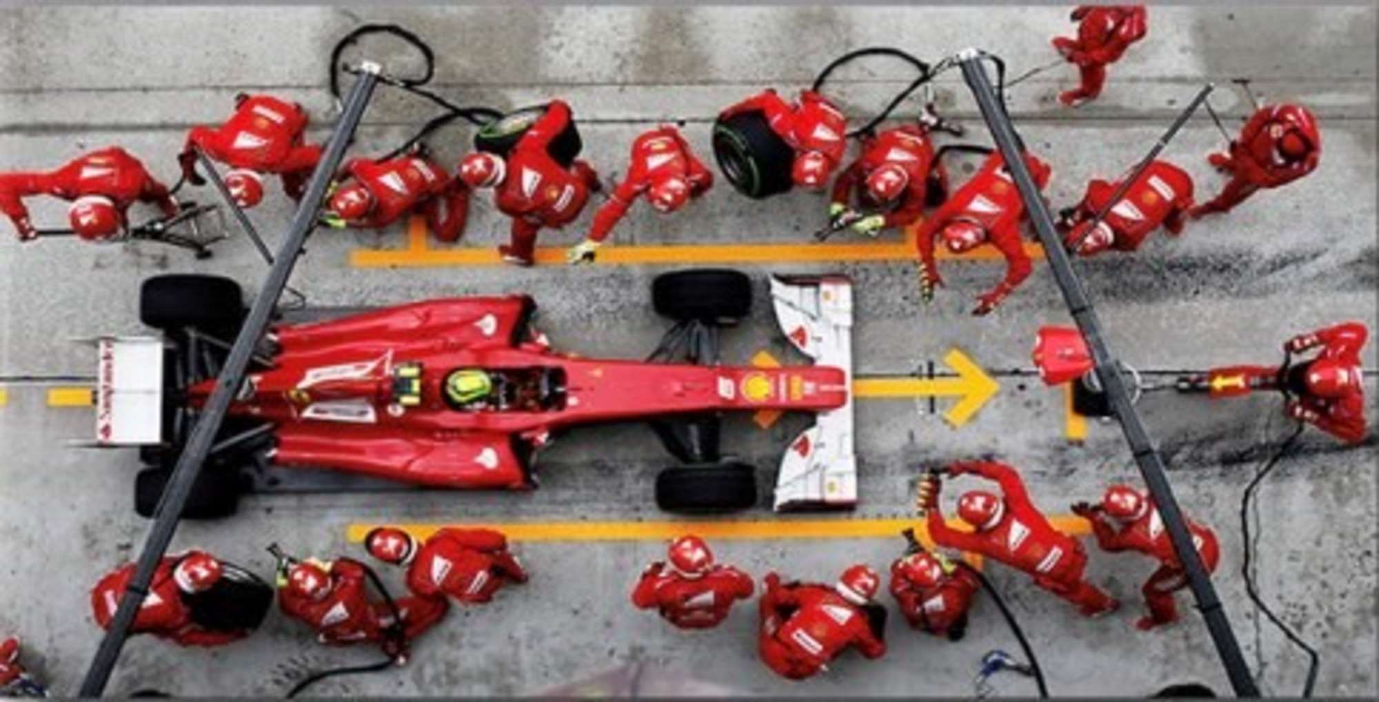 A large and impressive stretch canvas 'Ferrari Pitstop' -Sold