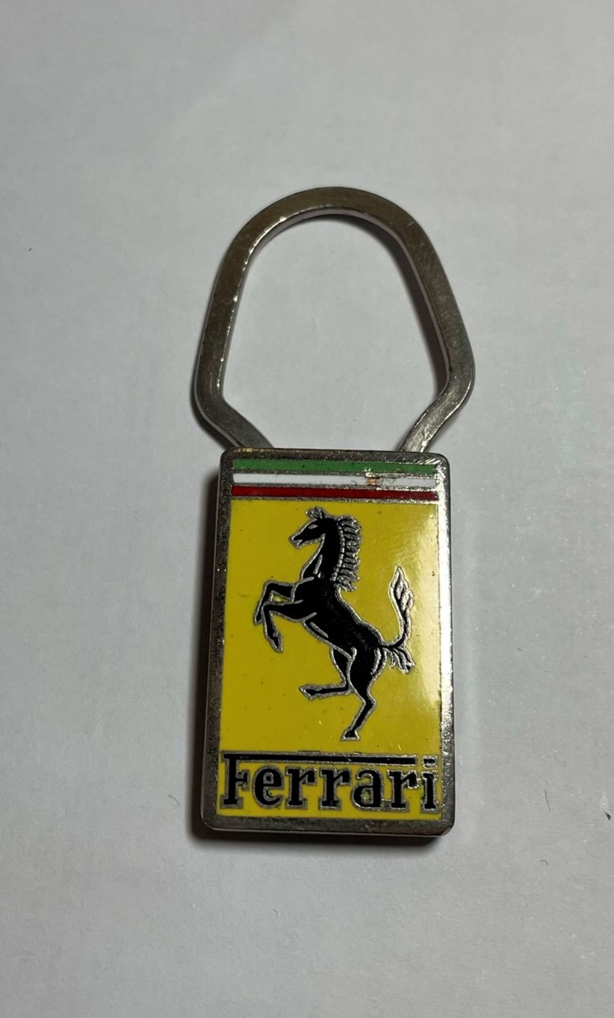 Ferrari 1960s Key Fob with Enamelled Cavallino Rampante -Auction Lot