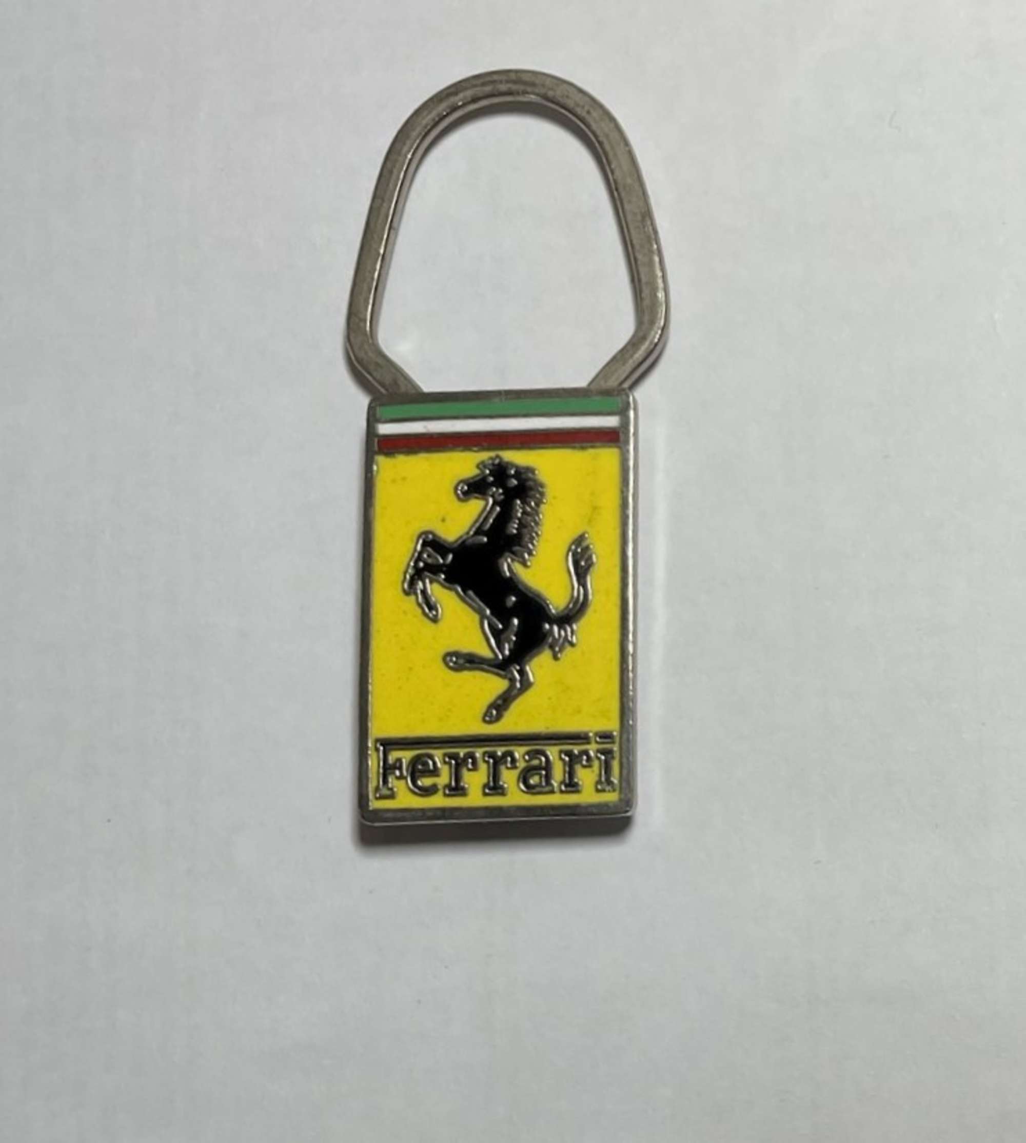 1970s Ferrari Key Ring Coloured Enamel E.F. Black Cavallino -Auction Lot