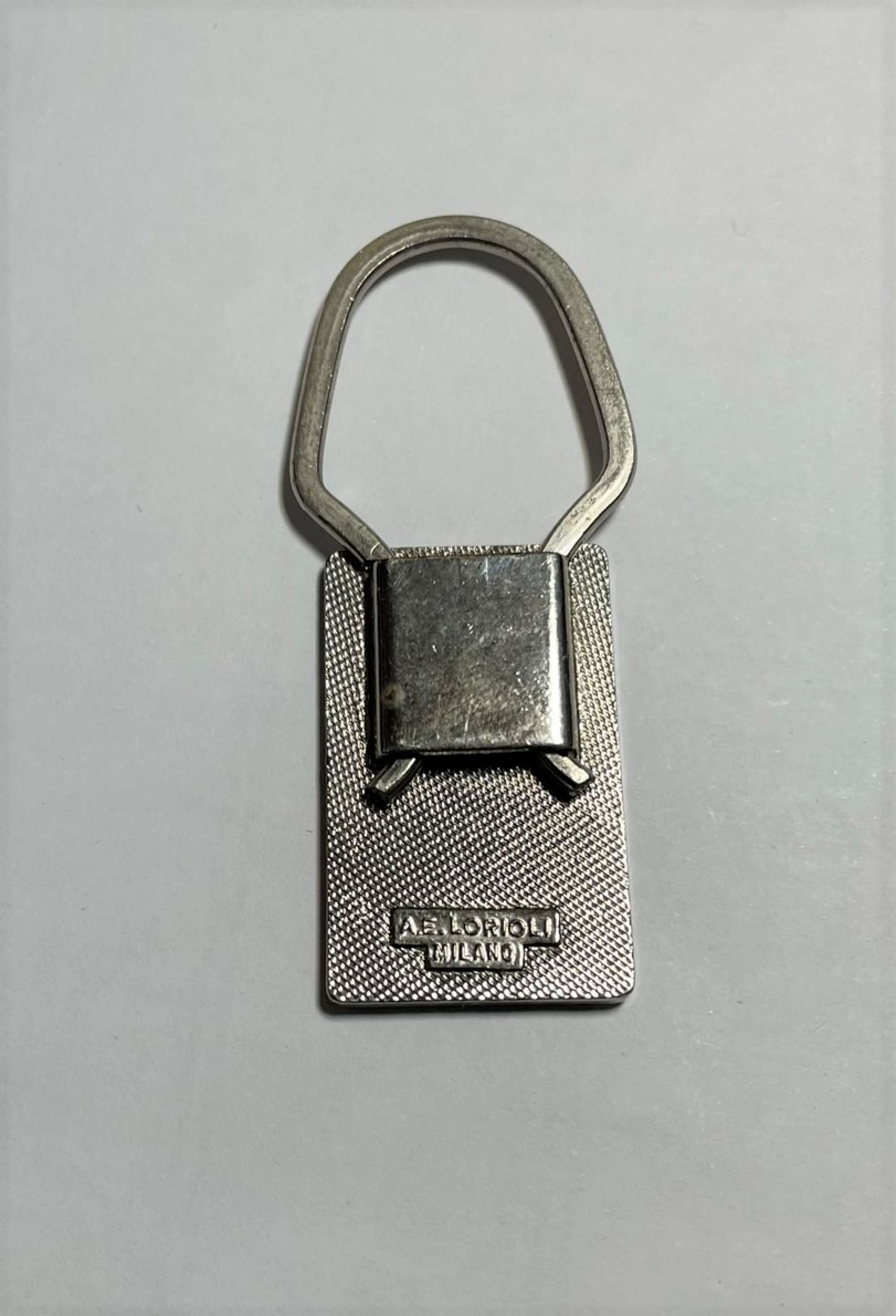 1970s Ferrari Key Ring Coloured Enamel E.F. Black Cavallino -Auction Lot