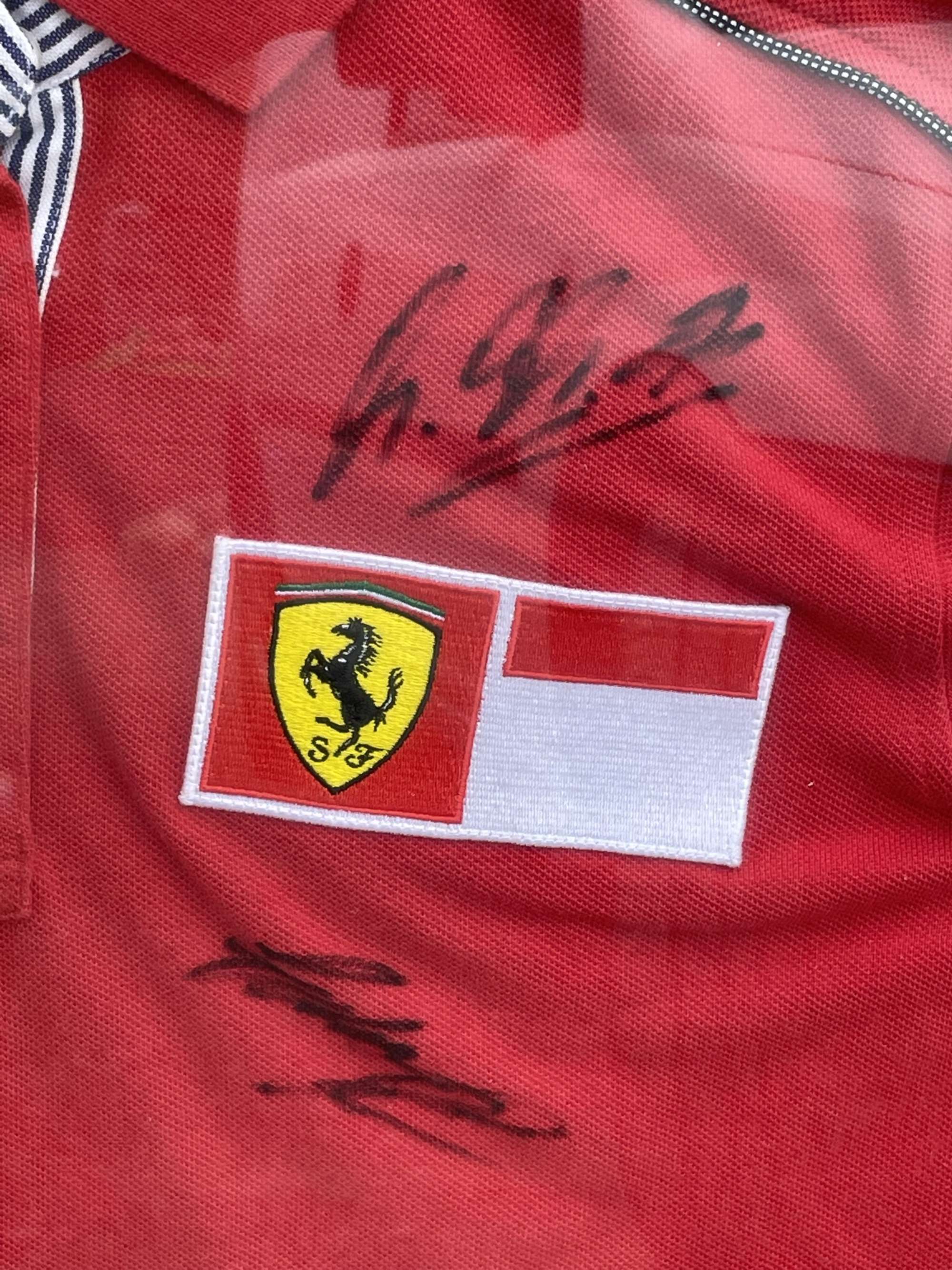 Ferrari Polo Shirt Signed by Michael Schumacher and Eddie Ir-Sold