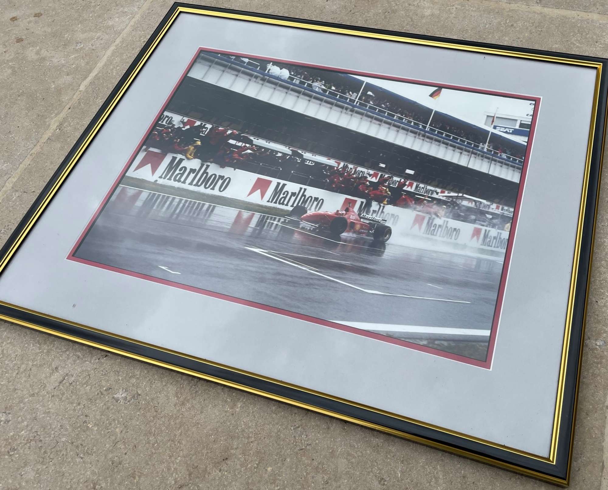 Six Assorted Racing Ferrari Prints-Sold