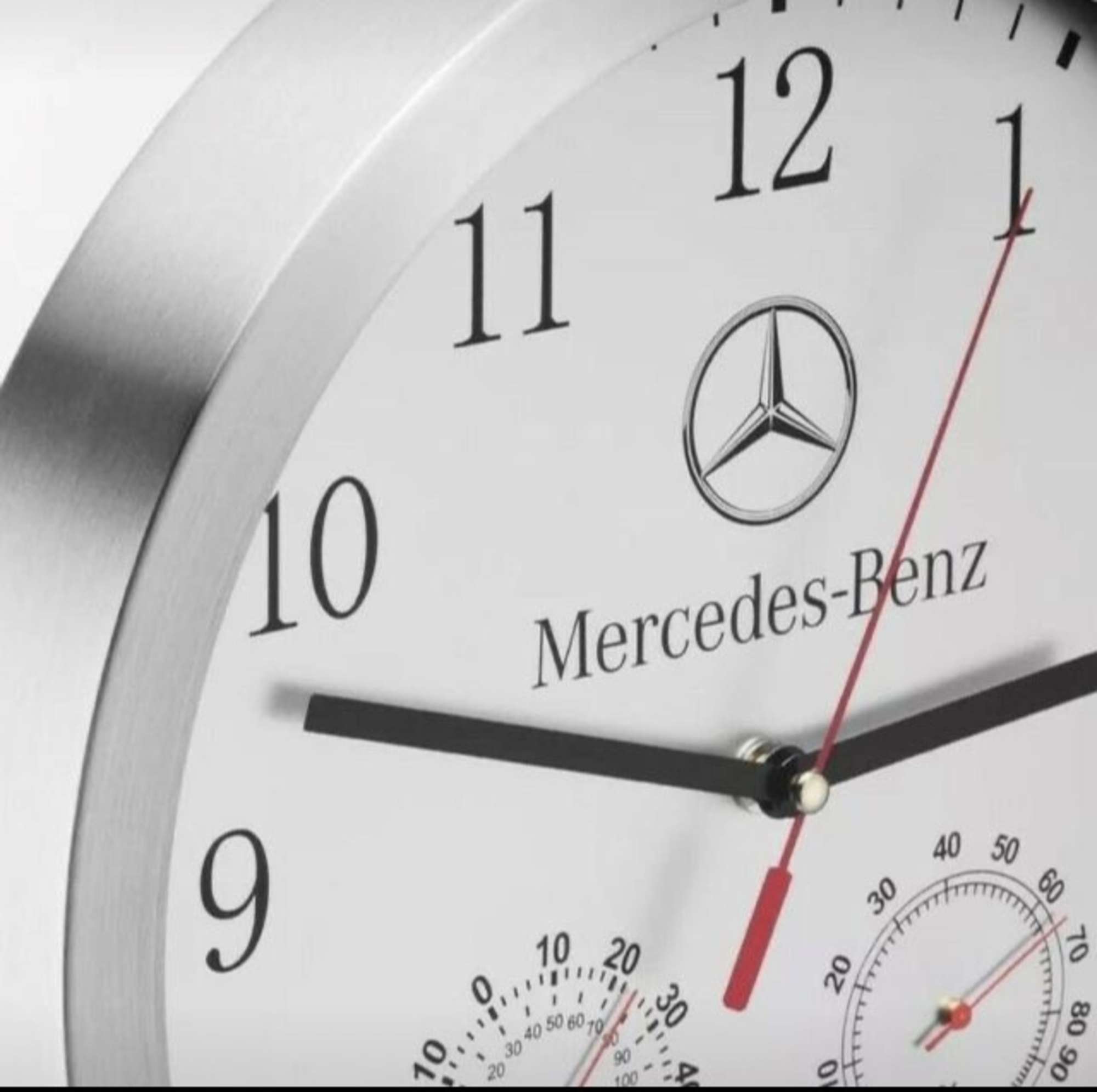 A Fine Mercedes-Benz Wall Clock in Brushed Aluminium-Sold