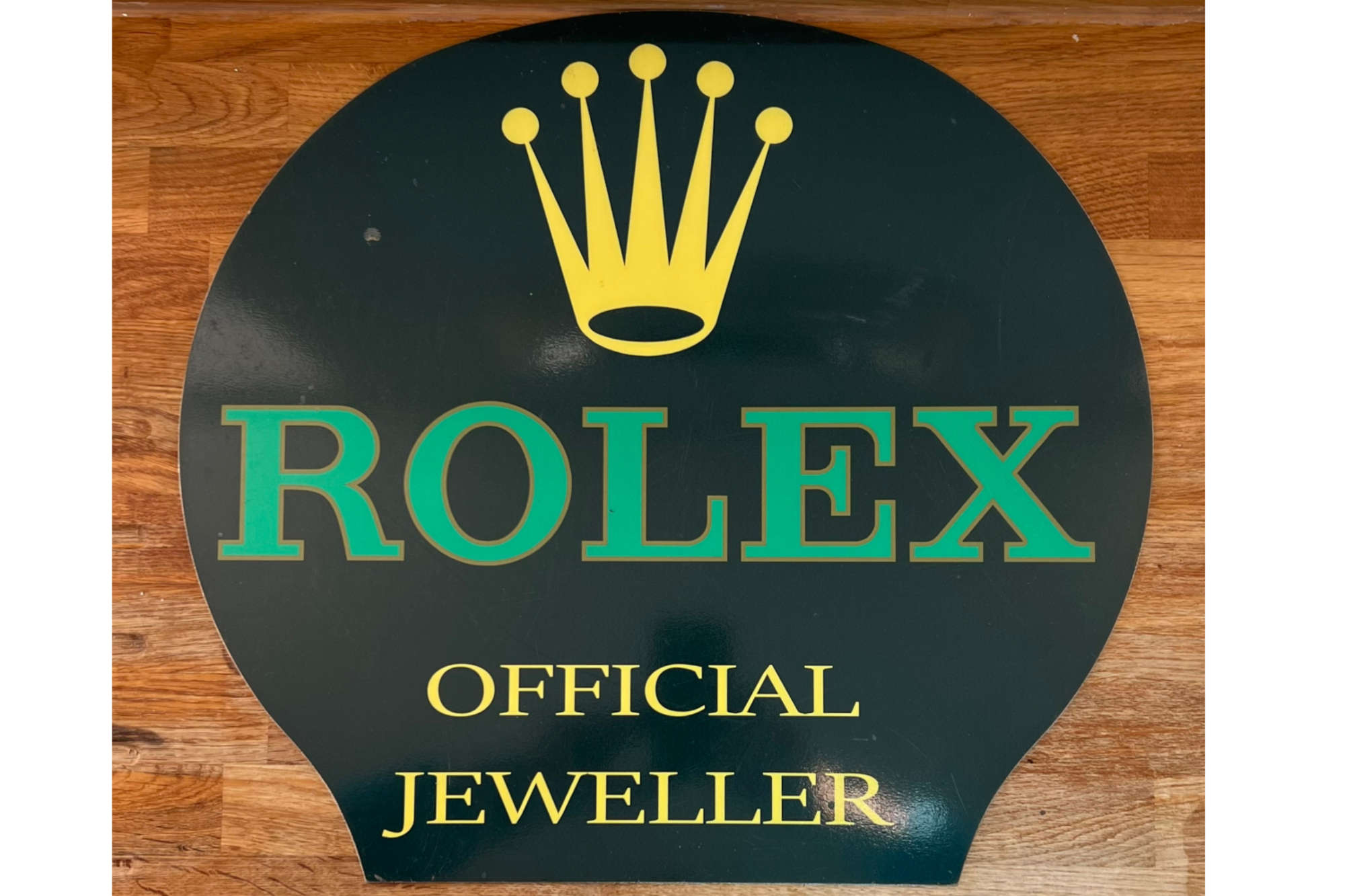 A Rare 'Rolex' Enamelled Tin-Plate Advertising Sign -Sold
