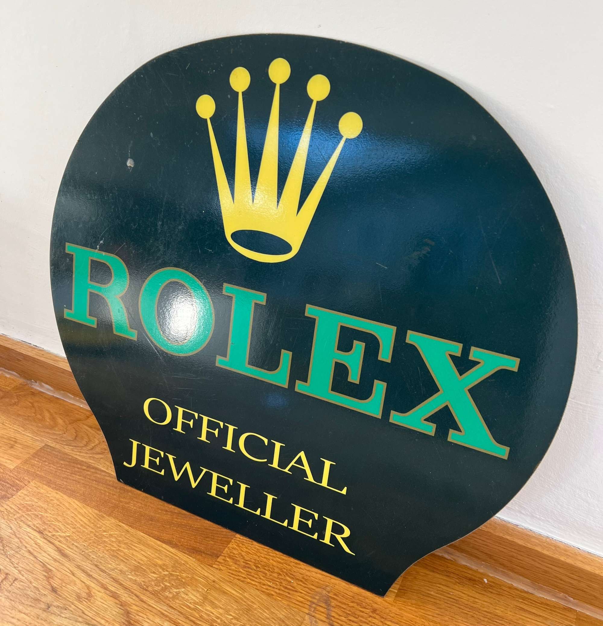 A Rare 'Rolex' Enamelled Tin-Plate Advertising Sign -Sold