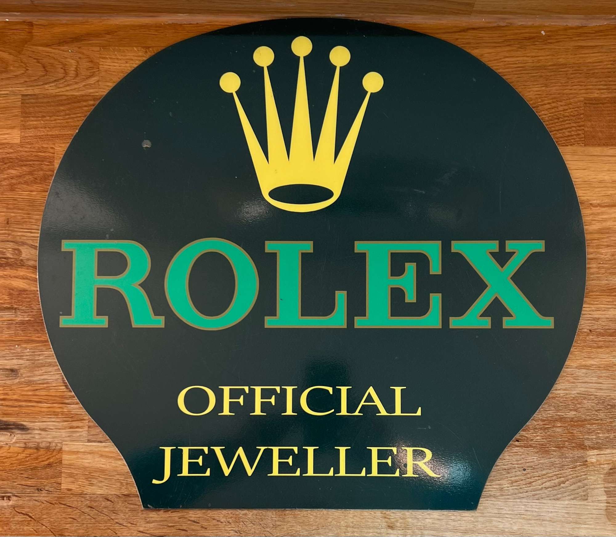 A Rare 'Rolex' Enamelled Tin-Plate Advertising Sign -Sold