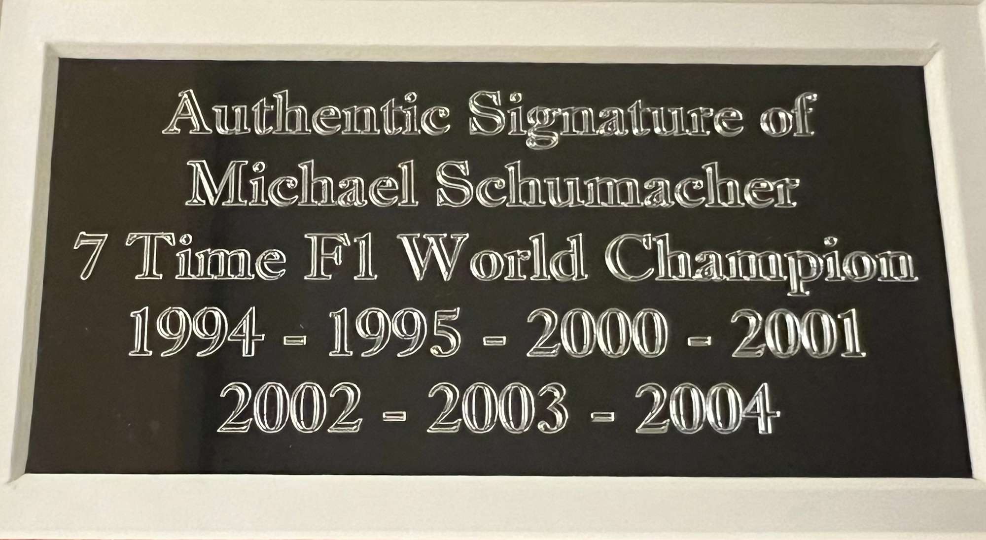 A Superb Framed Michael Schumacher Montage with a Hand-Signe-Sold