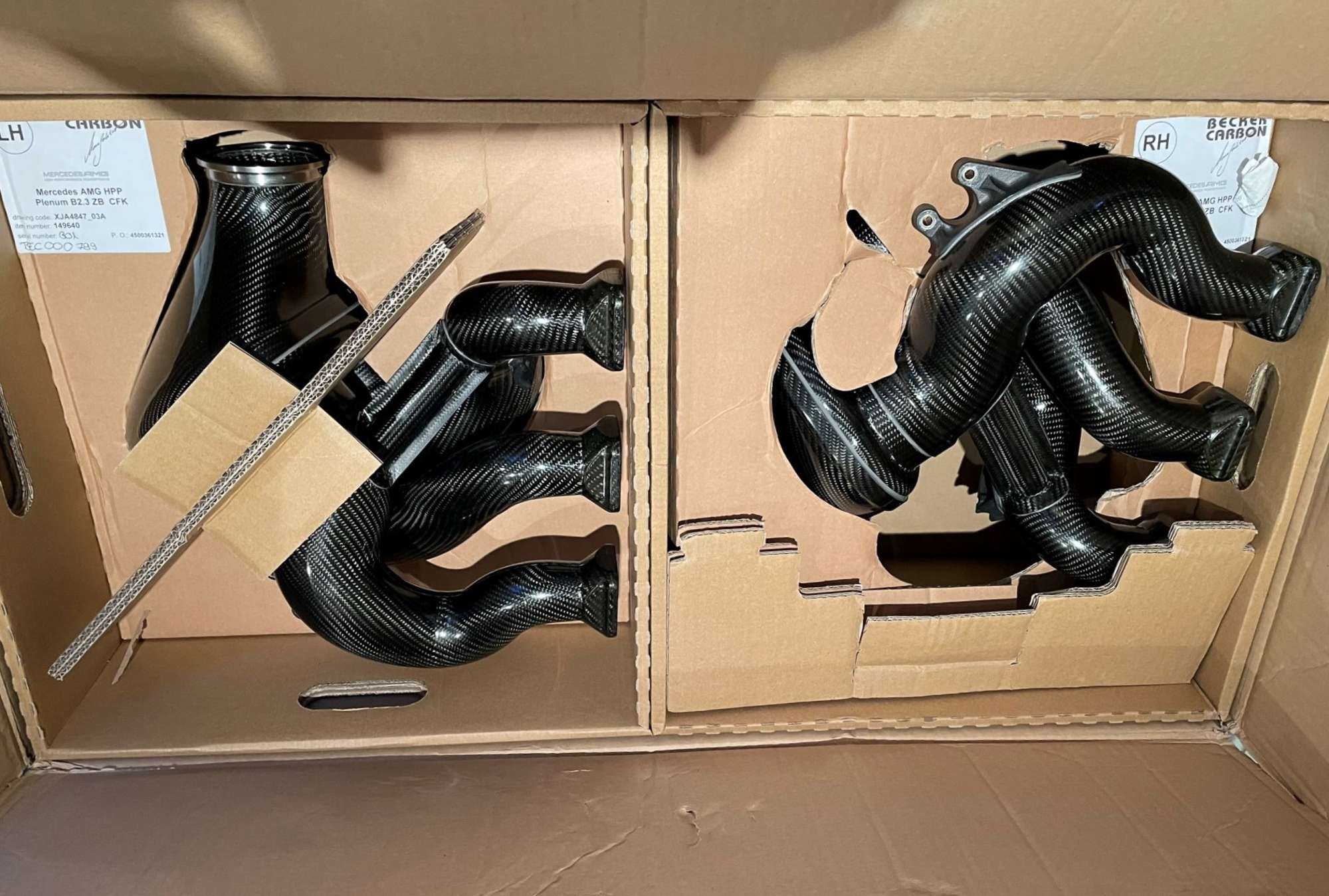 A Pair of Mercedes-AMG ONE Prototype Carbonfibre Intake Mani-Sold